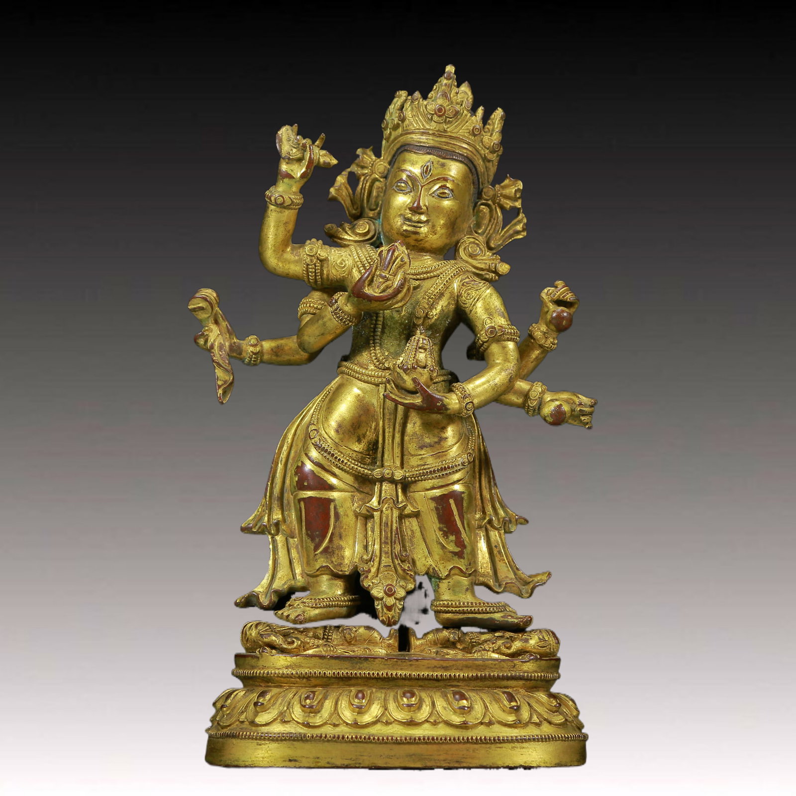 A Solemn Gilt Bronze Six-Armed Buddha: A Solemn Gilt Bronze Six-Armed Buddha,Ming Dynasty, China,Size: 4.3inx2.4inx7.9in,Weight:1165g 铜鎏金六臂佛像，明代