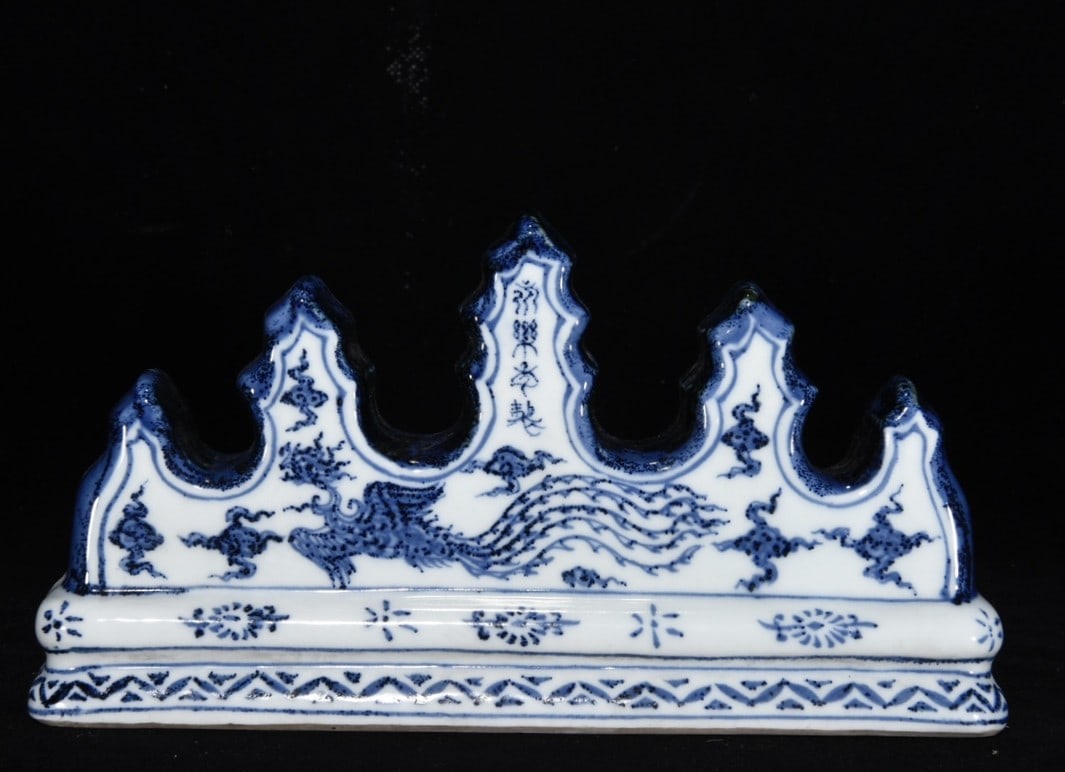 An Exquisite Blue and White Auspicious Cloud and Phoenix Pattern Brush Holder: An Exquisite Blue and White Auspicious Cloud and Phoenix Pattern Brush Holder,Ming Dynasty, China,Yongle Four-character Mark,Size:4.7inx8.7inx2.4in 