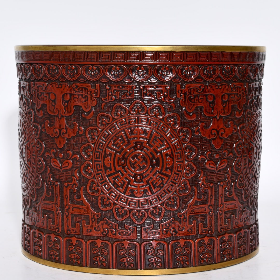 An Exquisite Iron-Red Glazed Gilt Beast-Face Pattern Brush Pot: An Exquisite Iron-Red Glazed Gilt Beast-Face Pattern Brush Pot,Qing Dynasty, China,Qianlong Six-character Mark,Size:6.8inx8.3in 