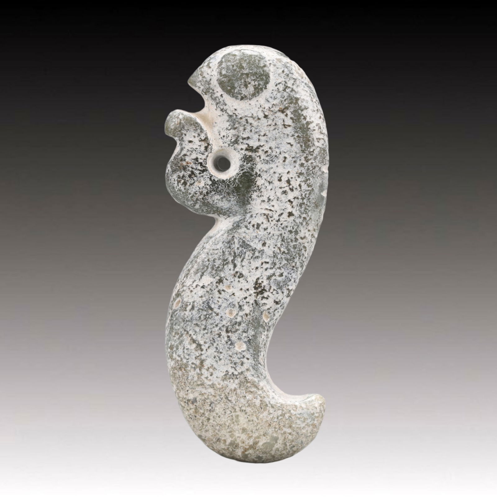 An Archaic Hongshan Culture Cyan jade Pendant: An Archaic Hongshan Culture Cyan jade Pendant,Ancient Time, China,Size:1inx2.6in Weight:34.2g 