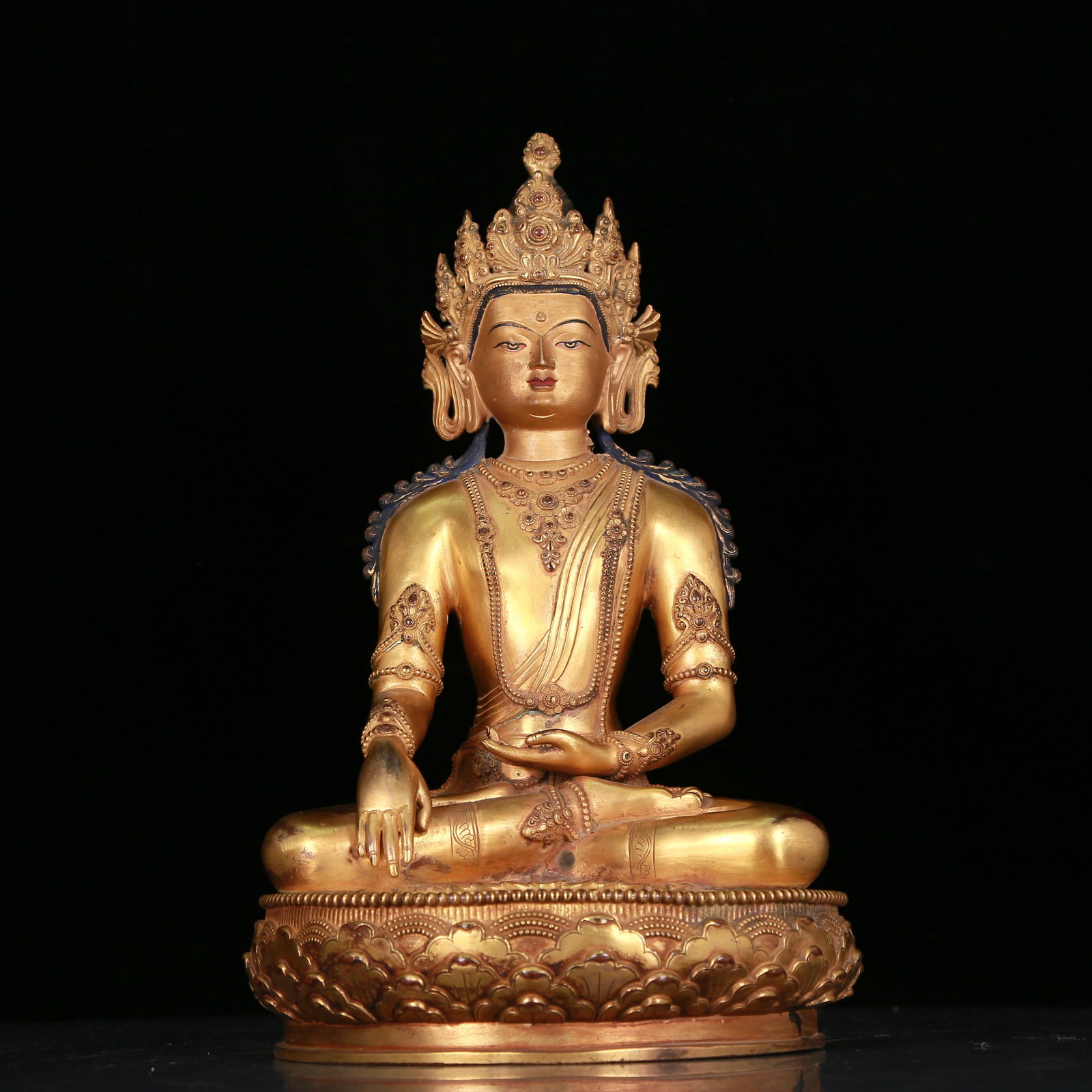 An Elaborate Gilt-Bronze Figure Of Longevity Buddha: An Elaborate Gilt-Bronze Figure Of Longevity Buddha. Seated with a peaceful expression, body adorned with jewelry ornaments, topknot surmounted by a splendid diadem. Chinese Ming Dynasty. Size:8.3inx1