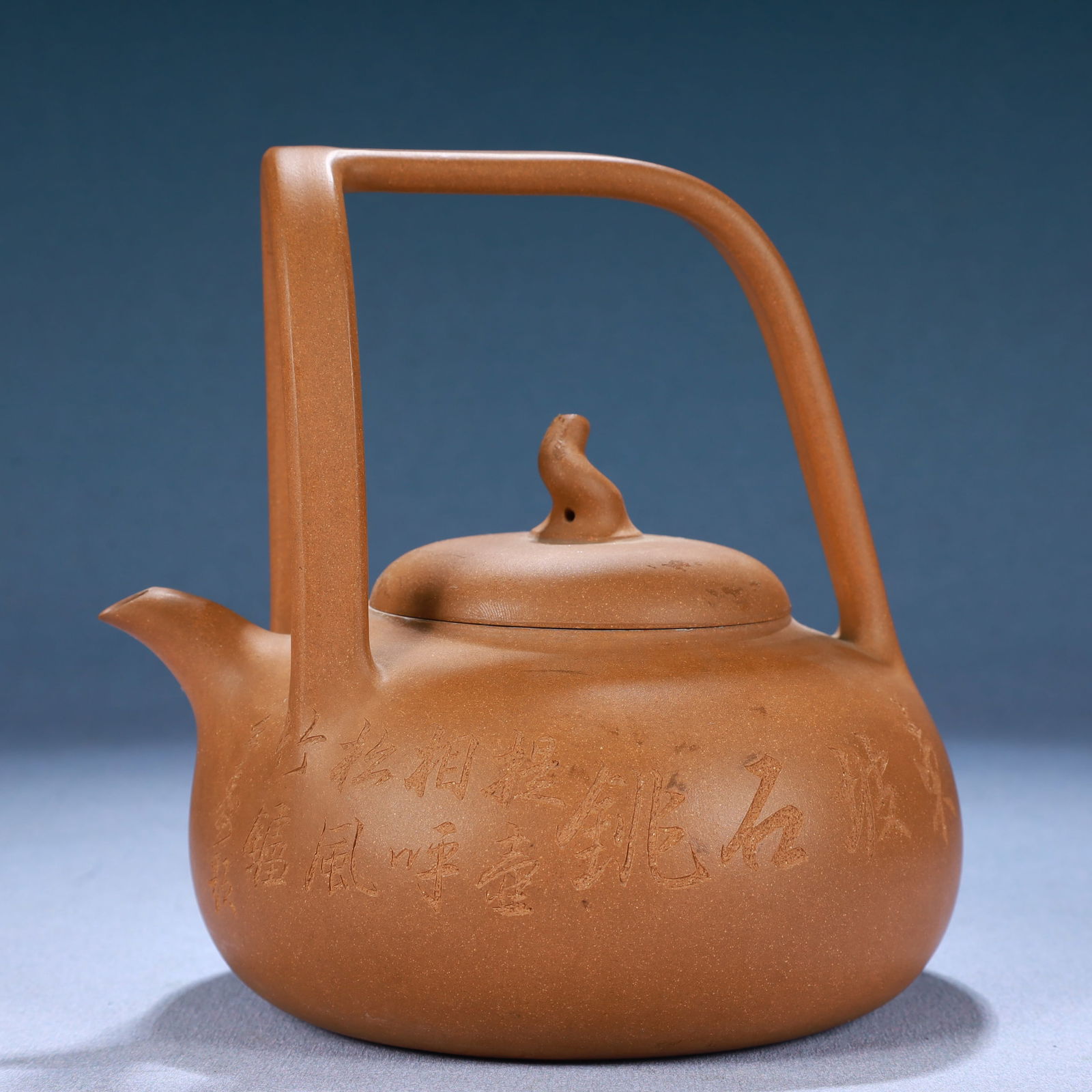 A Yixing Clay Ewer With Poem Inscriptions And An Overhead Handle (1 of 12)