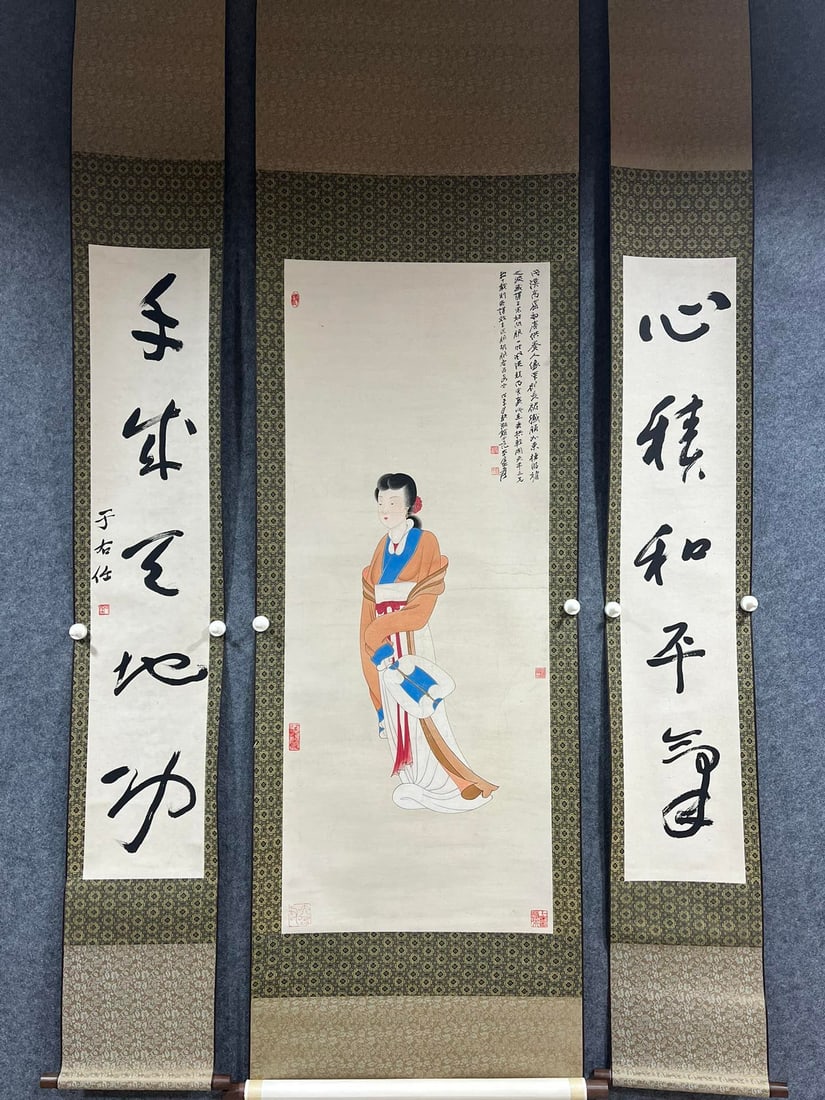 A Chinese Vertical Scroll Ink Painting of Woman on Paper,With A Chinese Vertical Scroll Ink: A Chinese Vertical Scroll Ink Painting of Woman on Paper,With A Chinese Vertical Scroll Ink Calligraphy Couplet on Paper,Zhang Daqian,Size:(Without frame)19.7inx49.2in,(Couplet)8.7inx45.7in 一&#