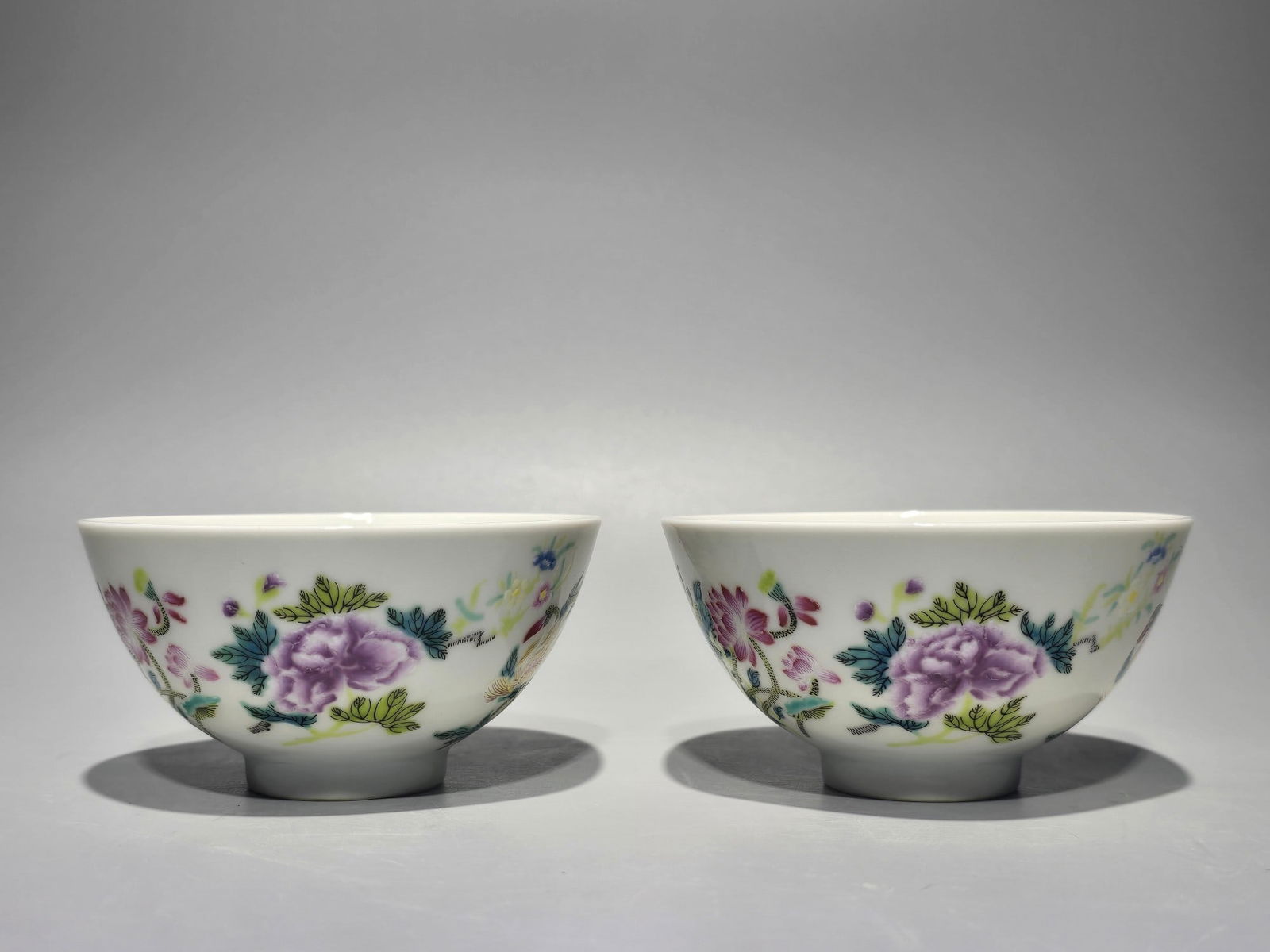 A Pair of Exquisite Famille-Rose Flower Pattern Cups: A Pair of Exquisite Famille-Rose Flower Pattern Cups,Qing Dynasty,China,Yongzheng Six-character Mark,Size:1.9inx3.6in 