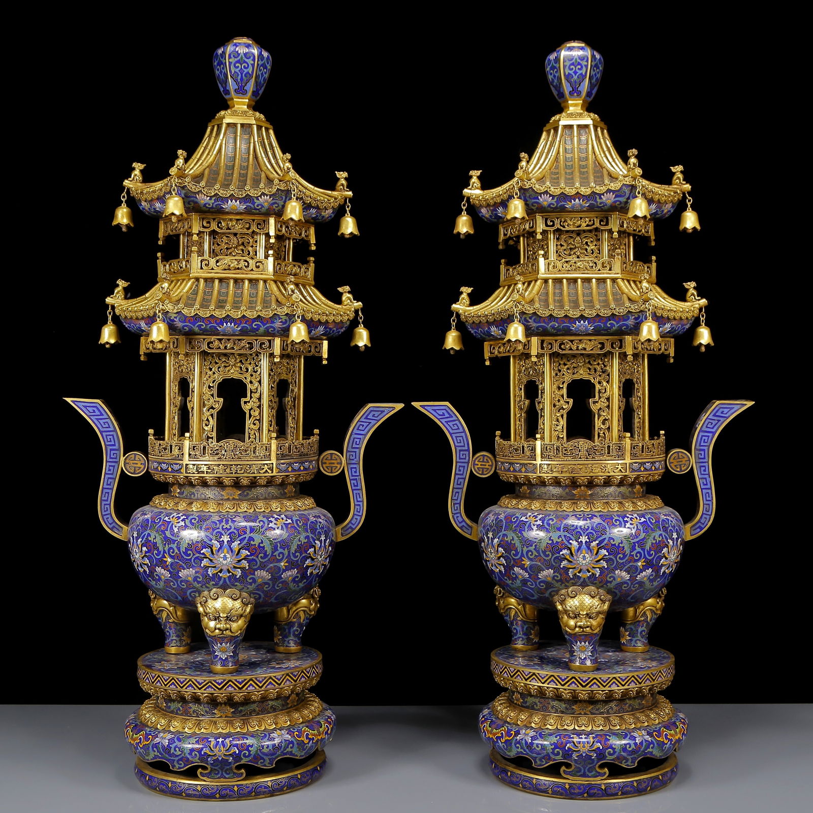 A Pair of Huge Cloisonne Lotus Pattern Double-Ears and Tripod Pagooda-Shaped Censers: A Pair of Huge Cloisonne Lotus Pattern Double-Ears and Tripod Pagooda-Shaped Censers,Qing Dynasty, China,Qianlong Six-character Mark,Size:15.7inx7.9inx33.9in,Total Weight:52500g 一对ਾ