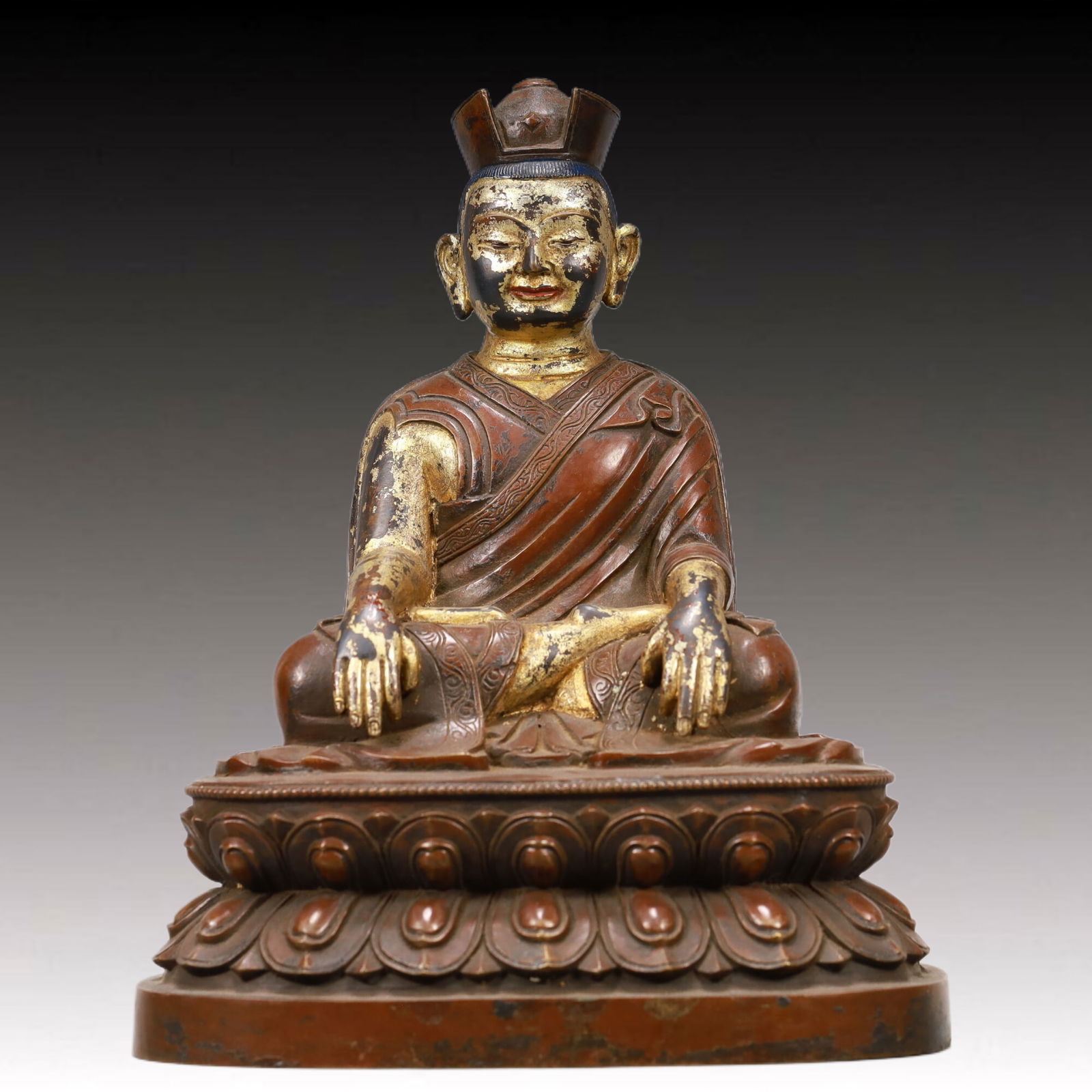 An Excellent Gilt-Bronze Figure Of Brog.Mi: An Excellent Gilt-Bronze Figure Of Brog.Mi. The figure with a dignified expression is seated,body rendered clad in long,flowing robes,the voluminous drapery elegantly cascading in folds. Chinese Ming