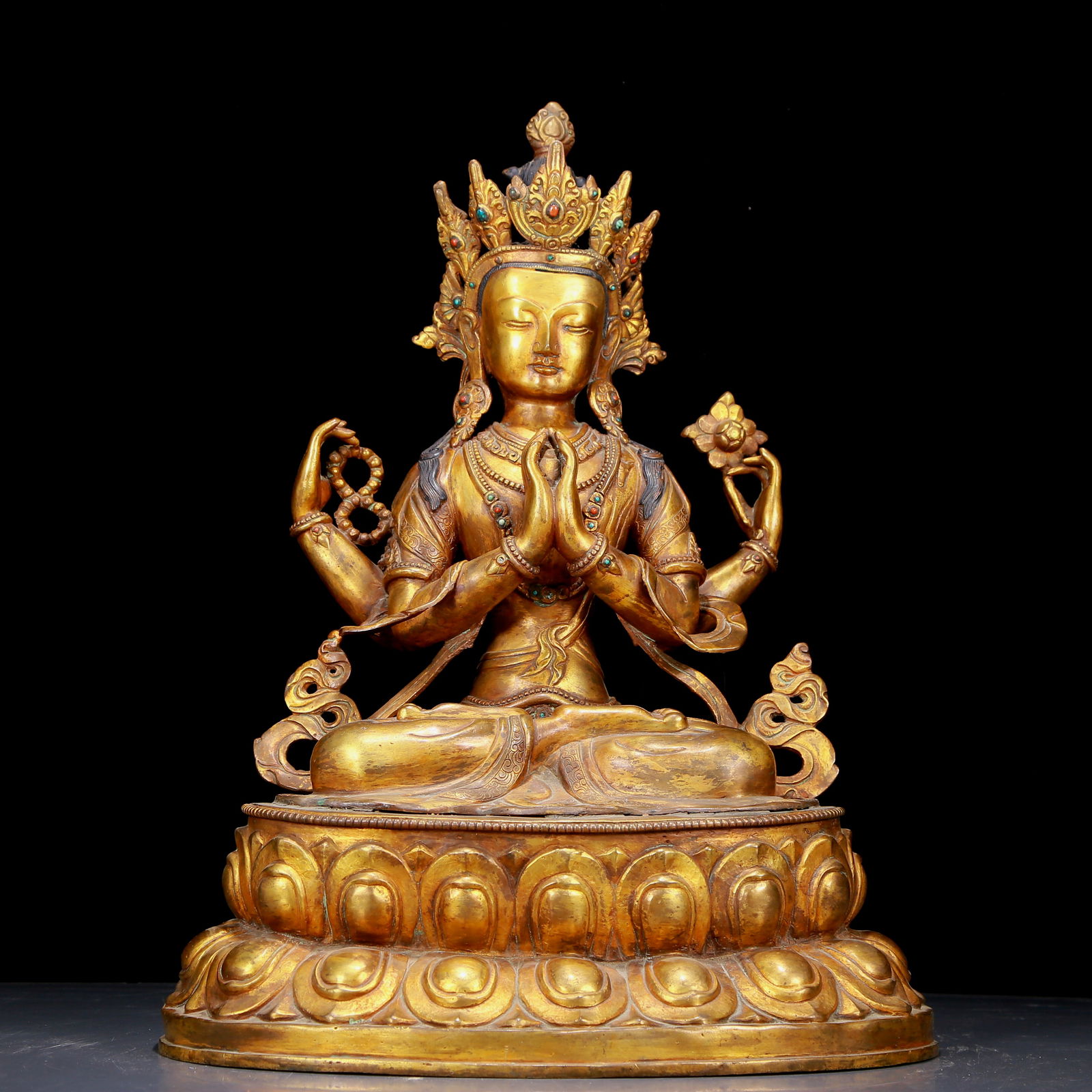 A large gilt bronze four-armed Avalokitesvara statue with inscription: A huge gilt bronze four-armed Guanyin statue with inscription, Ming Dynasty, China, dimensions: 14.6inx11inx19.7in; Weight: 13970g 