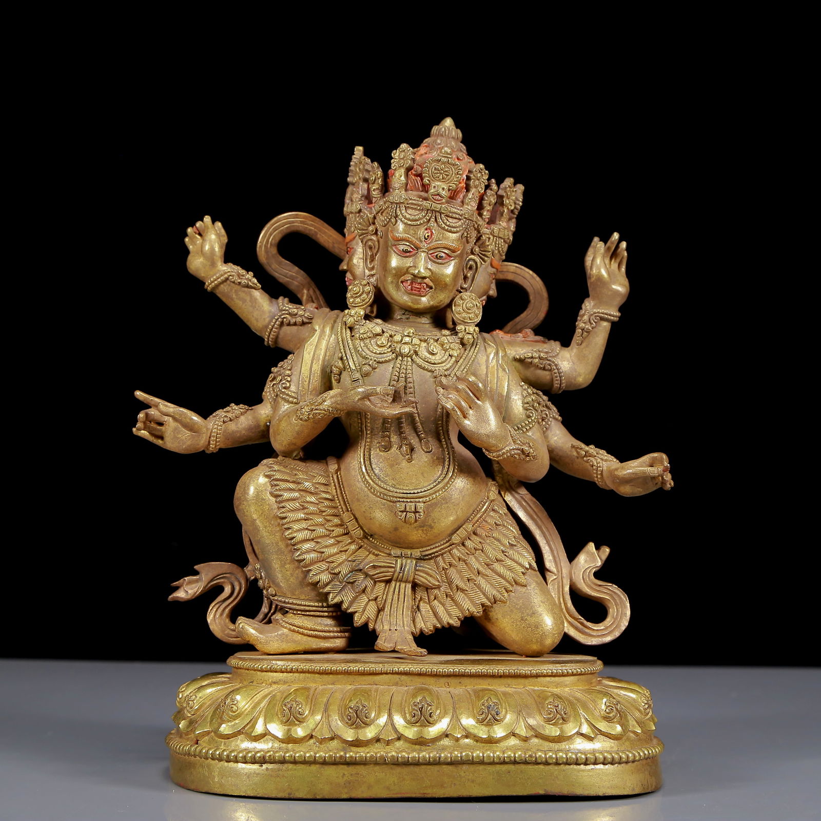 A Solemn Gilt Bronze Statue of Three-Headed and Six-Armed Vajra: A Solemn Gilt Bronze Statue of Three-Headed and Six-Armed Vajra,Ming Dynasty, China,Size:7.5inx5.5inx10.2in,Weight:4415g 