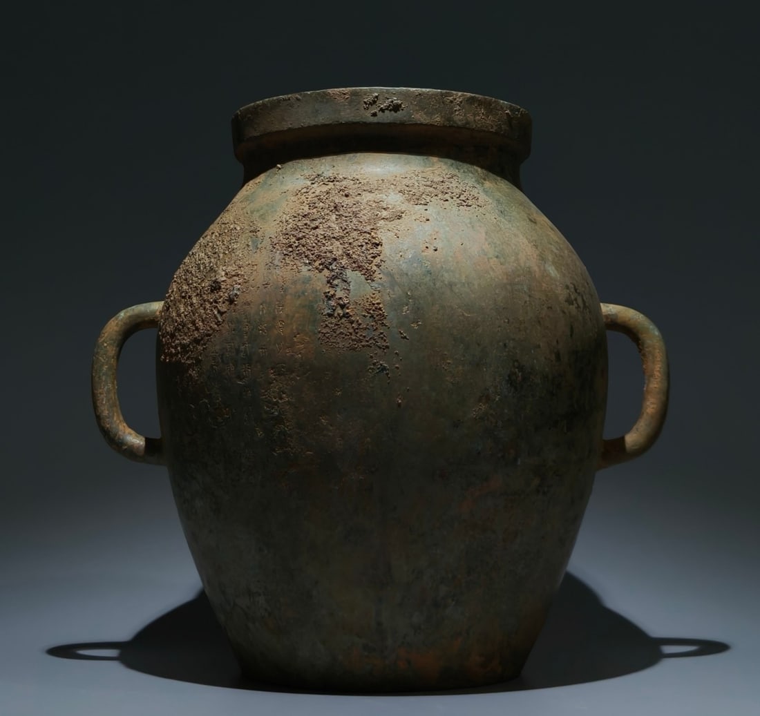 An Archaic Bronze Double-Ears Food Vessel,With Inscription: An Archaic Bronze Double-Ears Food Vessel,With Inscription,the Warring States period in China,Size:15.4inx11.4in 