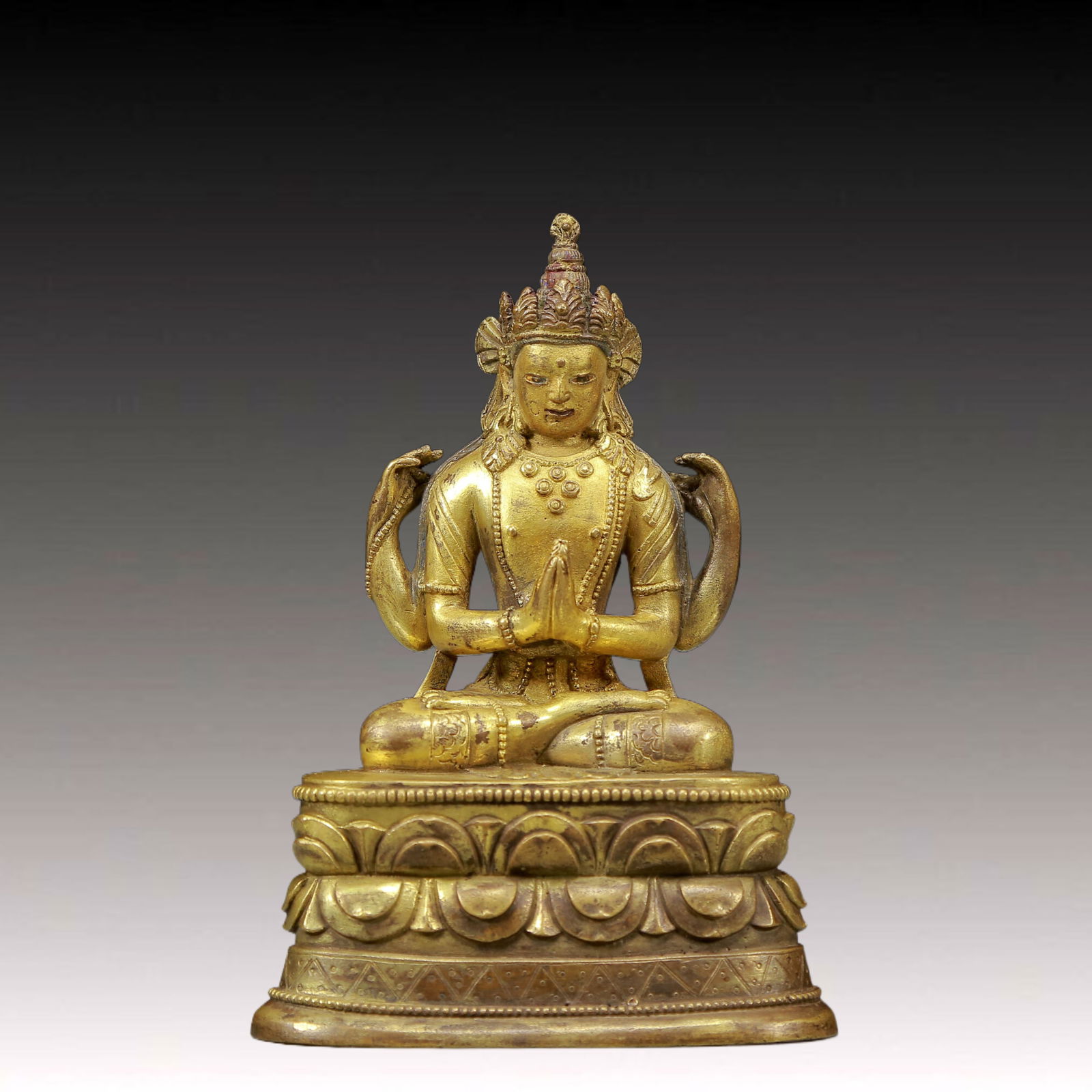 A Solemn Gilt Bronze Statue of Four-Armed Guanyin: A Solemn Gilt Bronze Statue of Four-Armed Guanyin,Ming Dynasty, China,Size:3.7inx2.6inx5.5in,Weight:615g 铜鎏金四臂观音像，明代