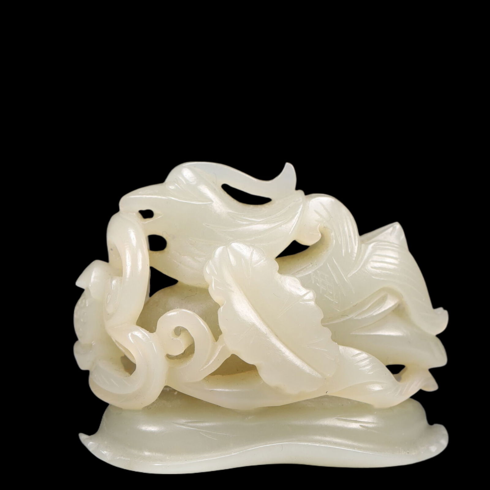 An Exquisite Greenish Jade Bird Ornament (1 of 6)