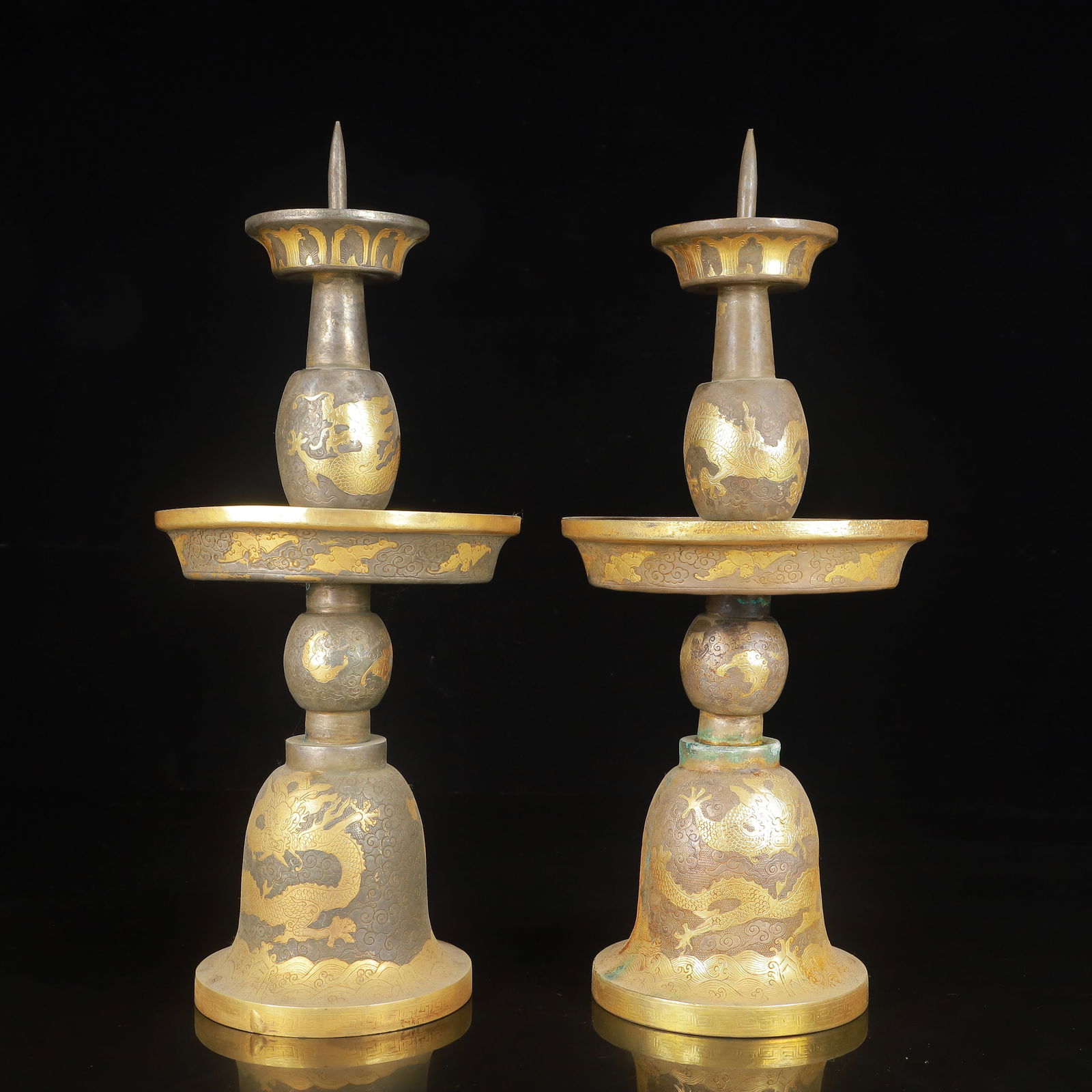 A Pair of Exquisite Gilt Silver Dragon Pattern Candlesticks: A Pair of Exquisite Gilt Silver Dragon Pattern Candlesticks,Tang Dynasty,China,Zhenguan Four-Character Mark,Size:5.5inx13in*2,Weight:2300g 