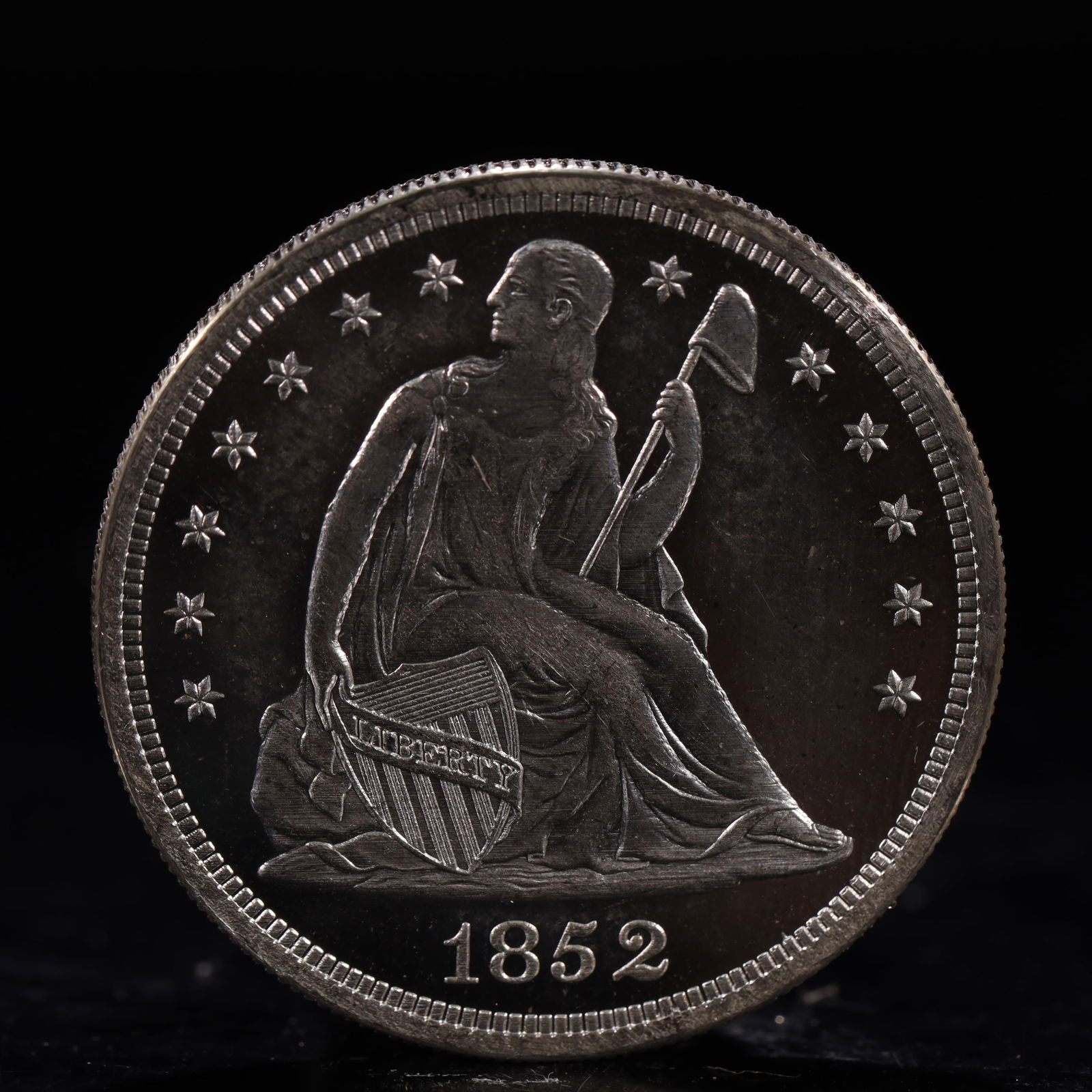 USA One Dollar 1852 Coin: American coin. IN GOD WE TRUST / LIBERTY / 1852 / UNITED STATES OF AMERICA / ONE DOL. Weight:26.9g.