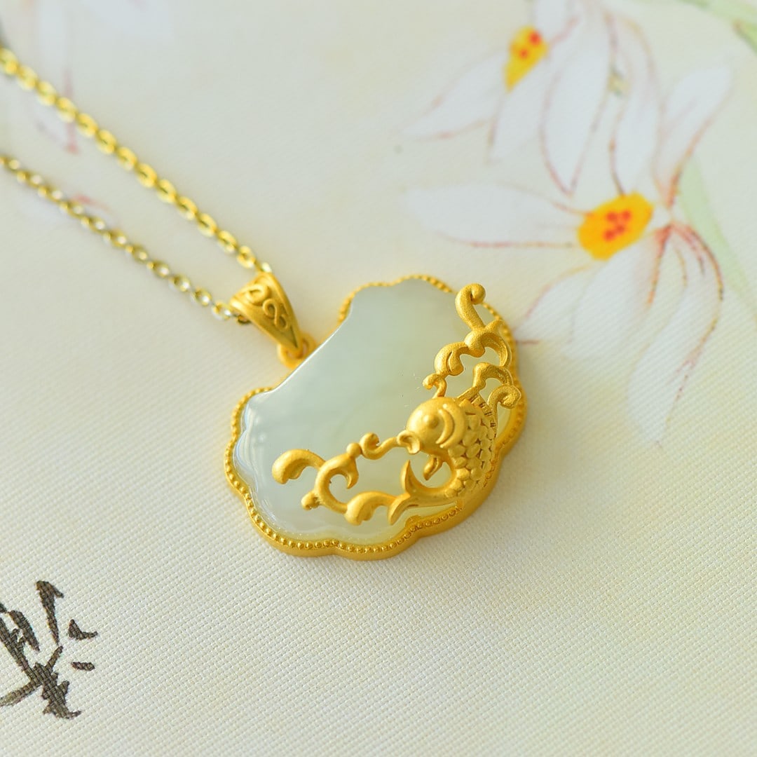 An Exquisite Sterling Silver-Gold Plated Inlaid White Jade Pendant: An Exquisite Sterling Silver-Gold Plated Inlaid White Jade Pendant 纯银镀金镶白玉吊坠