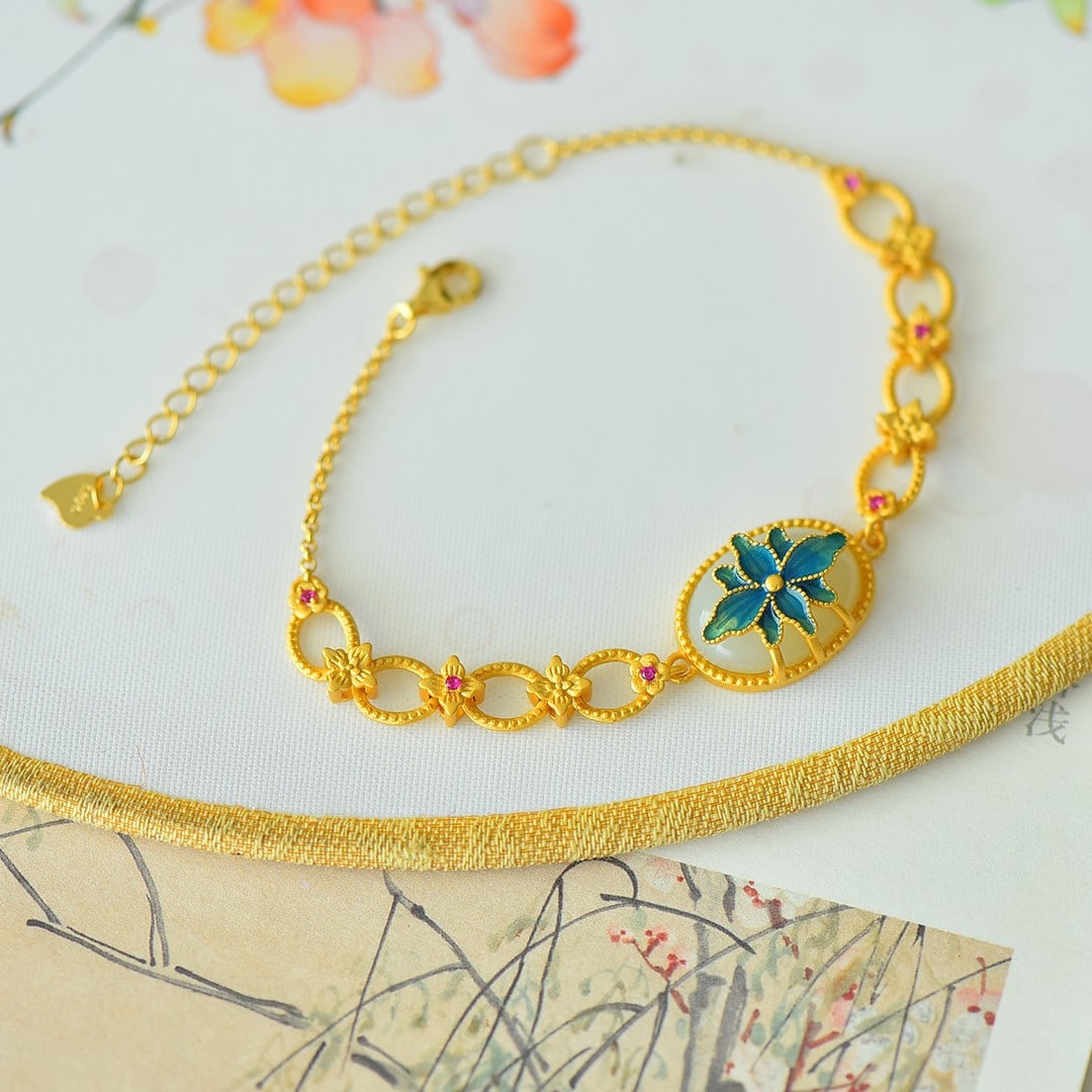 An Exquisite Sterling Silver-Gold Plated Inlaid White Jade Bracelet: An Exquisite Sterling Silver-Gold Plated Inlaid White Jade Bracelet,Size:12mmx16mm 纯银镀金镶白玉手链