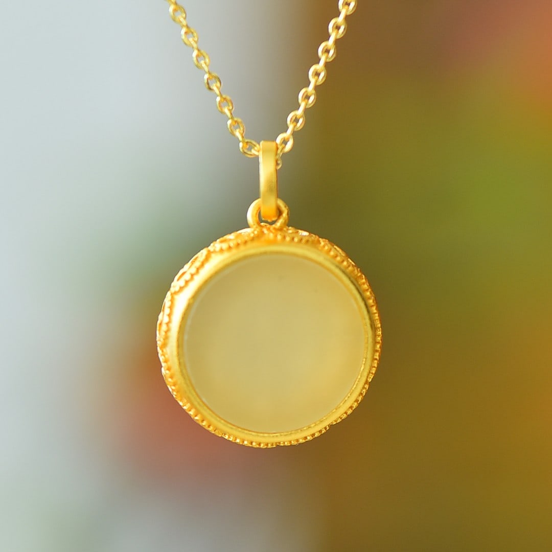 An Exquisite Sterling Silver-Gold Plated Inlaid White Jade Pendant: An Exquisite Sterling Silver-Gold Plated Inlaid White Jade Pendant 纯银镀金镶白玉吊坠