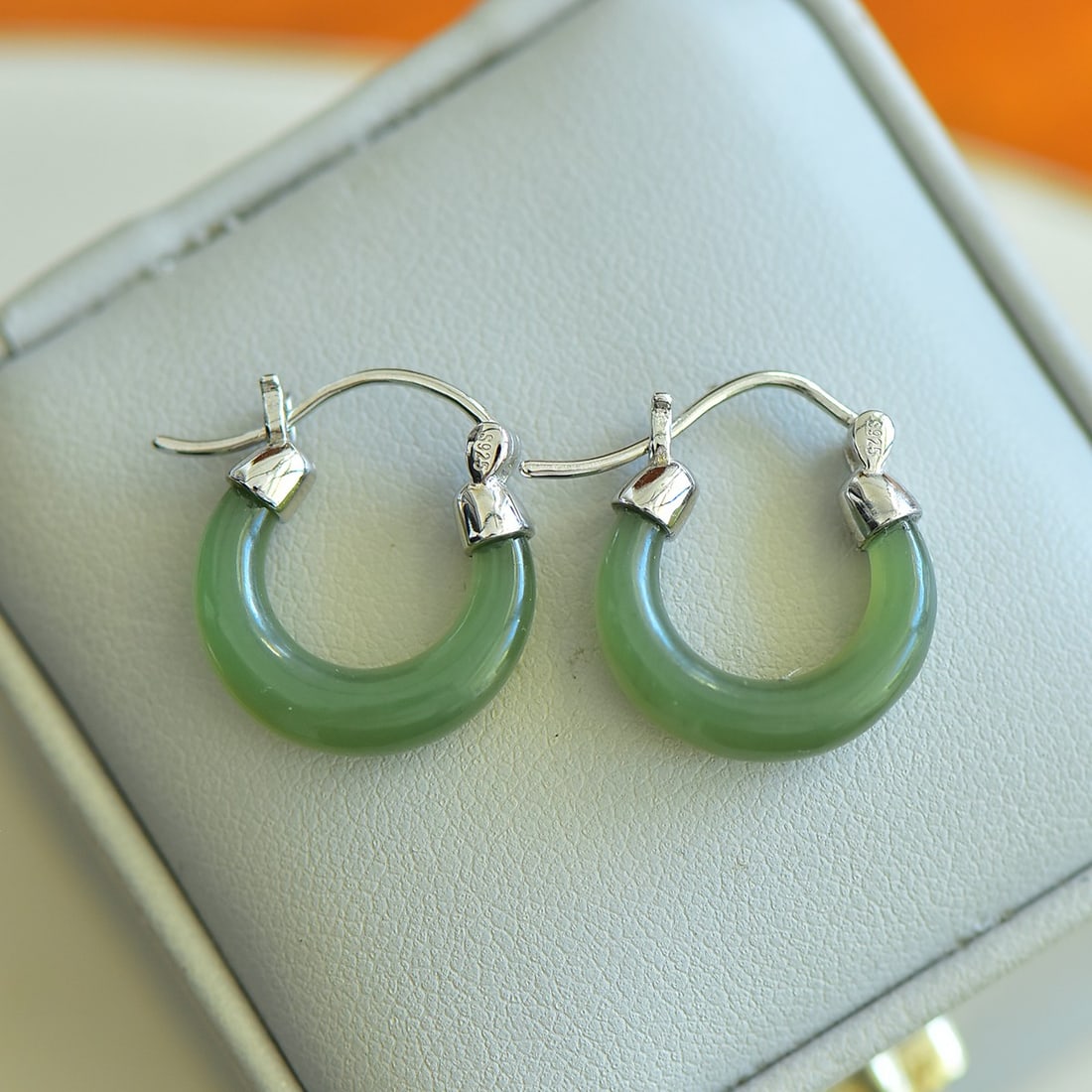 A Pair of Exquisite Sterling Silver Inlaid White Jade Earrings: A Pair of Exquisite Sterling Silver Inlaid White Jade Earrings,Size:5mmx17mm 一对纯银镶白玉耳环