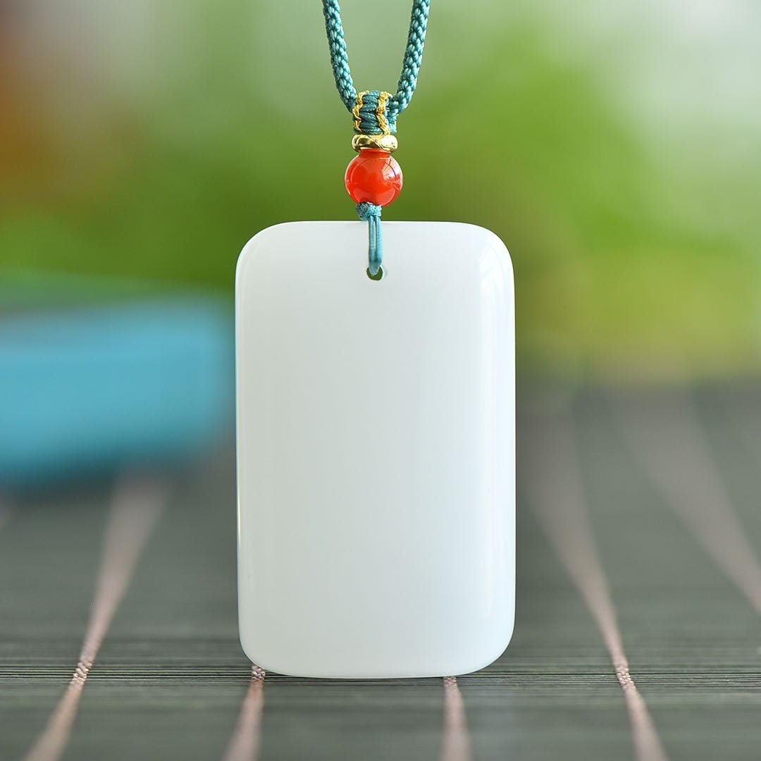 An Exquisite White Jade Pendant: An Exquisite White Jade Pendant,Size:30mmx50mm 白玉吊坠