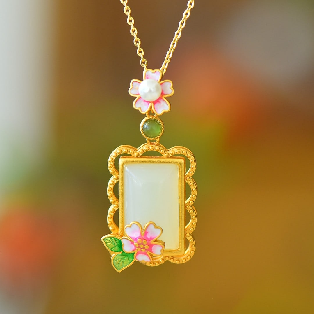 An Exquisite Sterling Silver-Gold Plated Inlaid White Jade Pendant: An Exquisite Sterling Silver-Gold Plated Inlaid White Jade Pendant 纯银镀金镶白玉吊坠