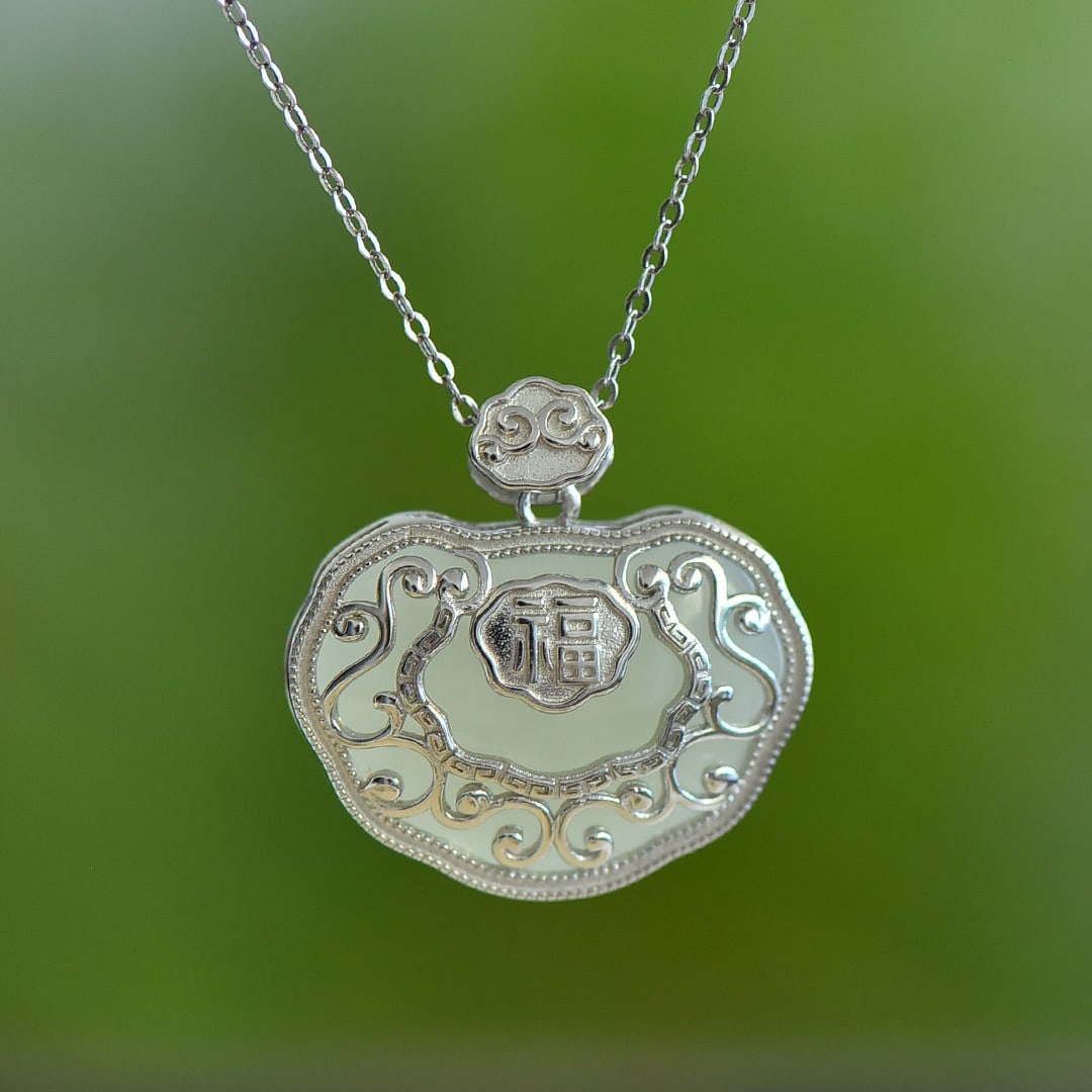 An Exquisite Sterling Silver Inlaid White Jade Pendant: An Exquisite Sterling Silver Inlaid White Jade Pendant 纯银镶白玉吊坠