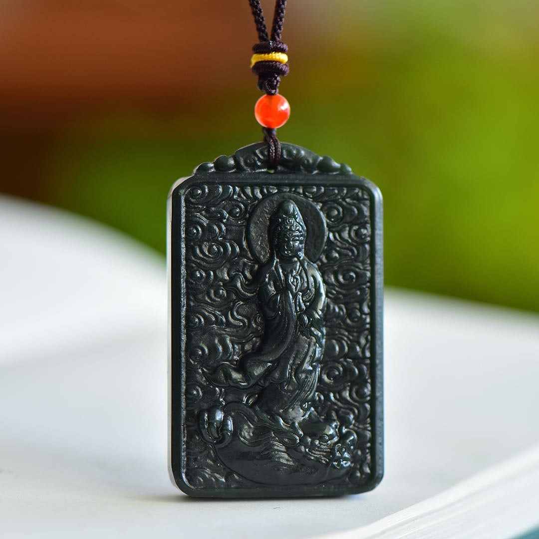An Exquisite Sapphire Auspicious Cloud and Avalokitesvara Pattern Pendant: An Exquisite Sapphire Auspicious Cloud and Avalokitesvara Pattern Pendant,Size:40mmx60mm 青玉祥云观音像纹吊坠