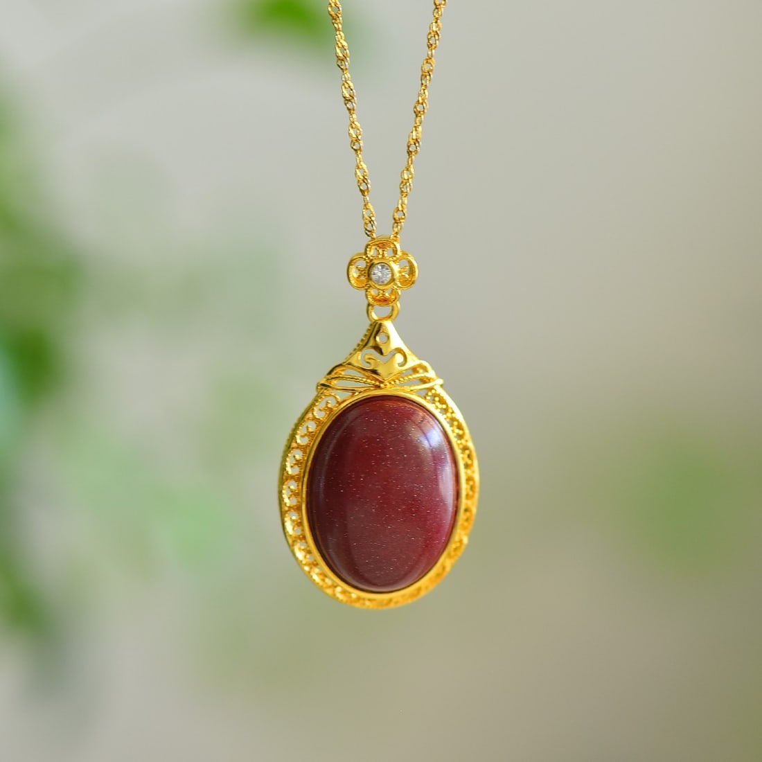 An Exquisite Sterling Silver-Gold Plated Inlaid Cinnabar Pendant: An Exquisite Sterling Silver-Gold Plated Inlaid Cinnabar Pendant,Size:15mmx20mm 寓意:圆圆满满 
