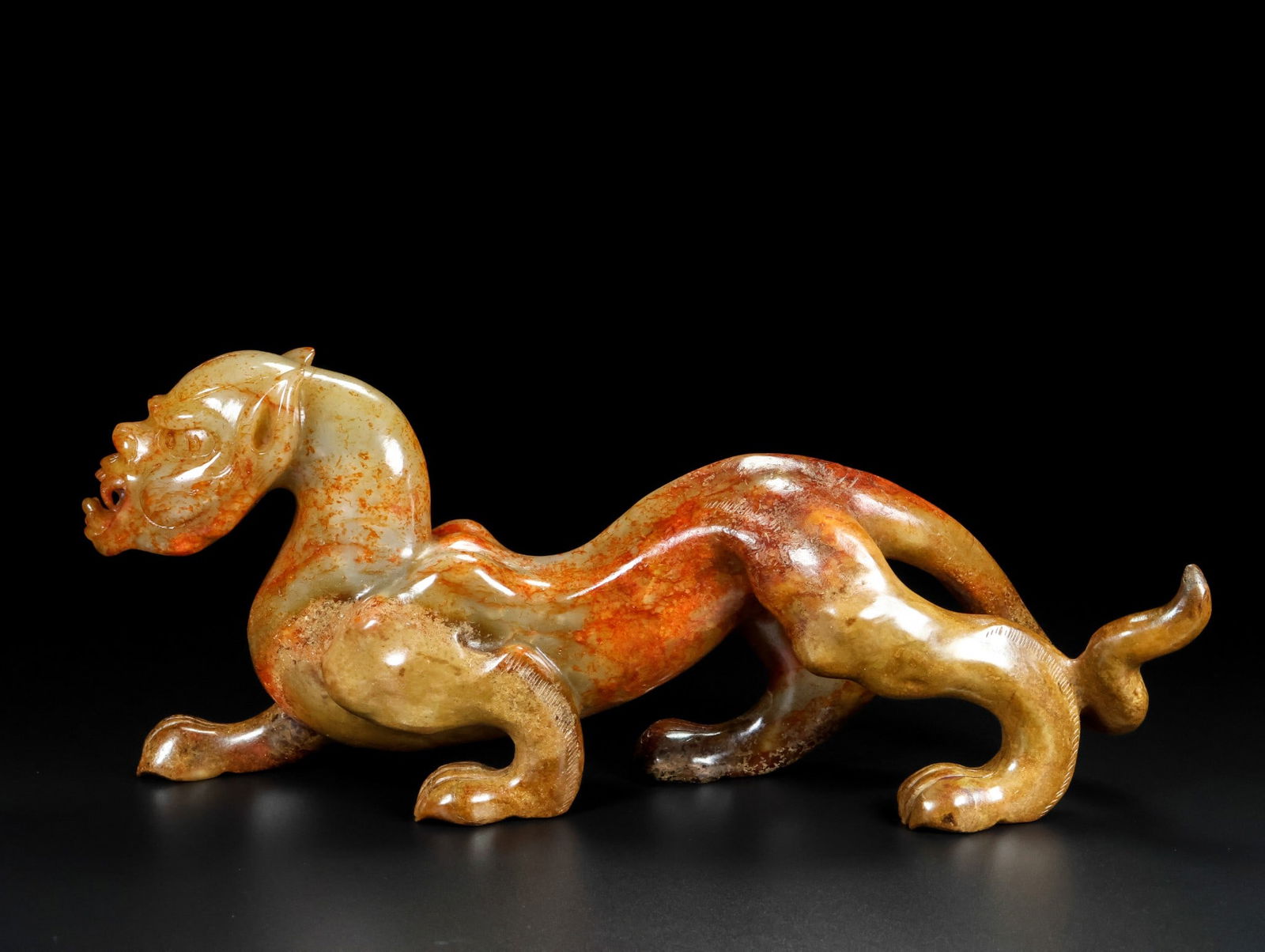 A Exquisite Hotan Jade Auspicious Beast Ornament: A Exquisite Hotan Jade Auspicious Beast Ornament,Han Dynasty, China,Size:33cmx14cmx8cm ???????,????
