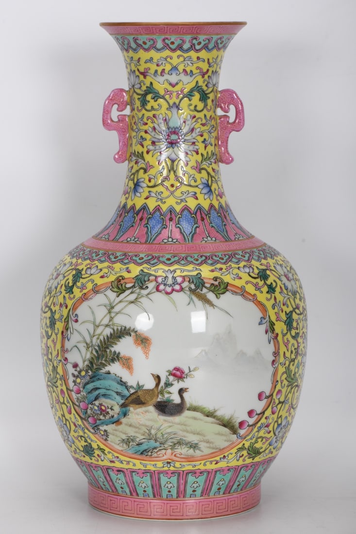 A Exquisite Famille-Rose Yellow-Ground Flower and Bird-Pattern Double-Ears Vase: A Exquisite Famille-Rose Yellow-Ground Flower and Bird-Pattern Double-Ears Vase,Qing Dynasty, China,Qianlong Six-character Mark,Size:32.2cmx9.7cmx17.8cmx11.7cm ???????????,????,?????