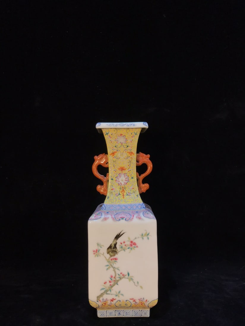 A Exquisite Famille-Rose Yellow-Ground Flower and Bird-Pattern Double-Ears Vase: A Exquisite Famille-Rose Yellow-Ground Flower and Bird-Pattern Double-Ears Vase,Qing Dynasty, China,Qianlong Six-character Mark,Size:30.4cmx8cmx8cm ???????????,????,?????