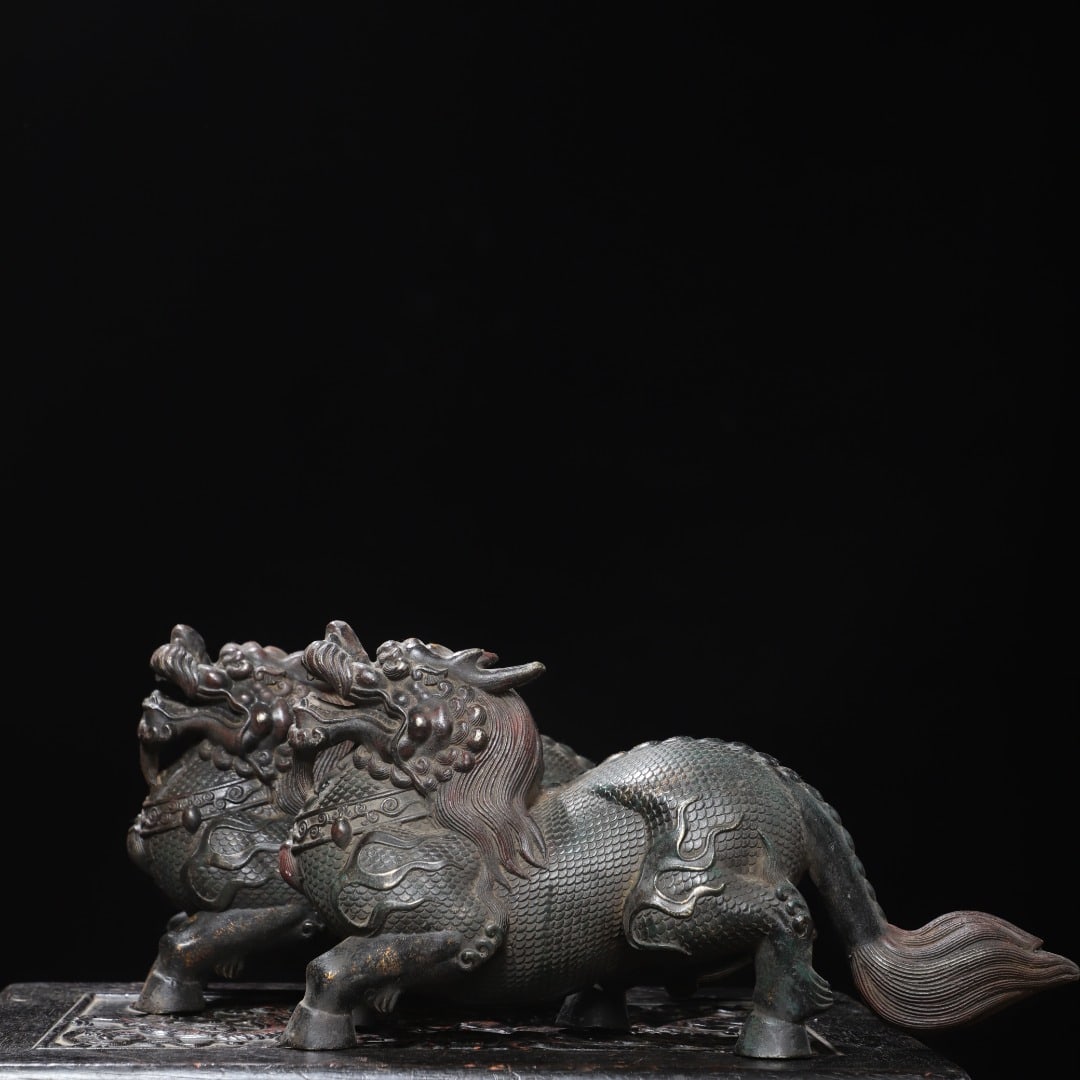 A pair of Exquisite Gold Overlaid Bronze Kylin Ornament: A pair of Exquisite Gold Overlaid Bronze Kylin Ornament,Qing Dynasty, China,With Mark,Size:33x7x17cm,Weight:8060g ?????????,????,??