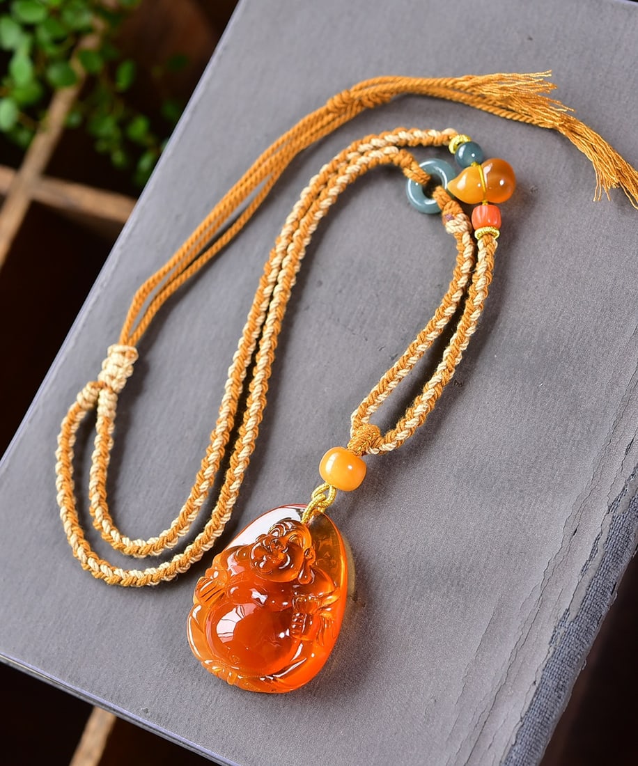 A Exquisite Amber Carved Buddha statue Necklace: A Exquisite Amber Carved Buddha statue Necklace,Size:4.6cmx3.6cmx1.7cm ???????