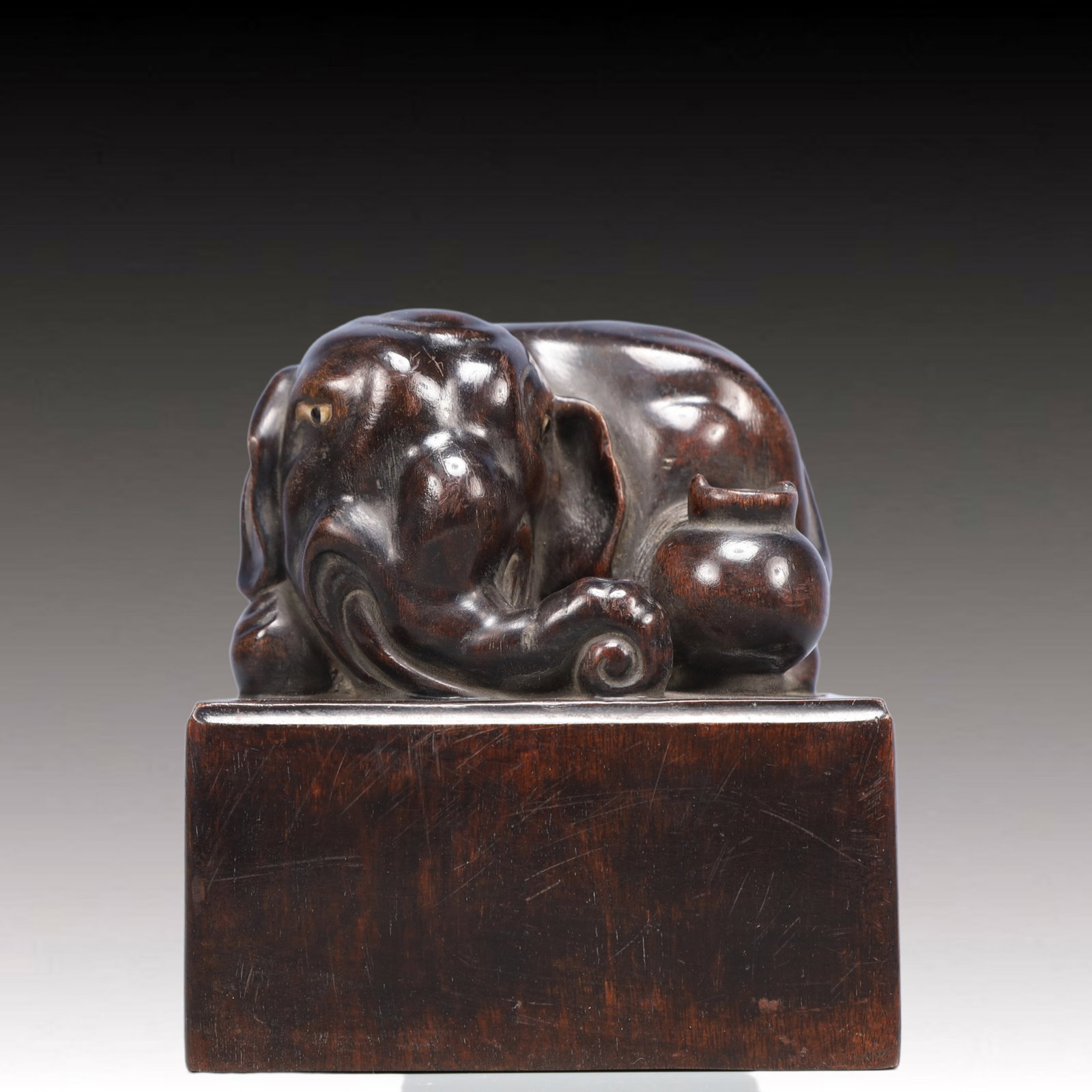 An Exquisite Zitanwood Elephant Pattern Seal: An Exquisite Zitanwood Elephant Pattern Seal,Qing Dynasty, China,Size:4.3inx4.7in,Weight:450g 紫檀木大象纹印章,中国清代