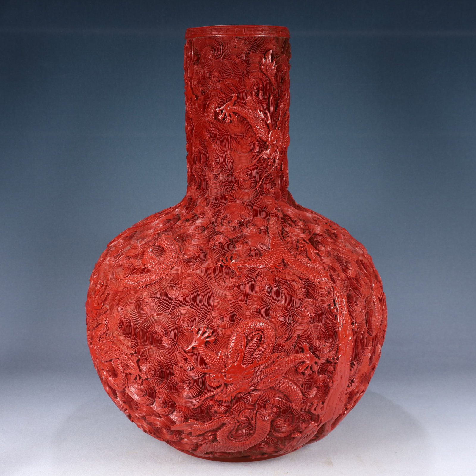 A Huge Carved Red Lacquer Seawater and Dragon Pattern Vase: A Huge Carved Red Lacquer Seawater and Dragon Pattern Vase,Qing Dynasty, China,Qianlong Six-character Mark,Size:15inx22.8in,Weight:7550g 剔红漆海水龙纹瓶