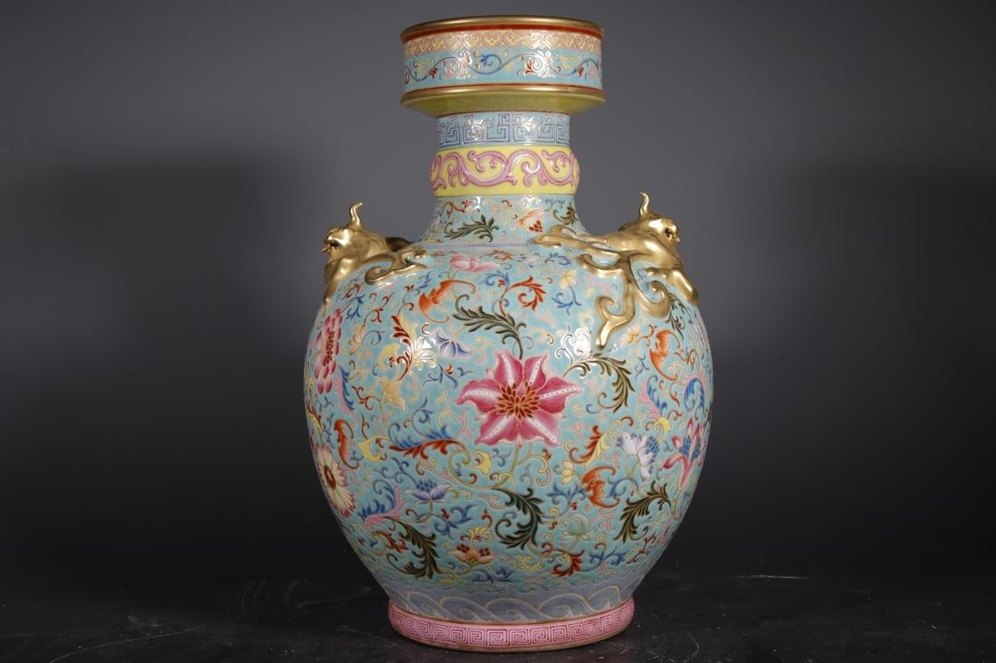 An Exquisite Green Ground Enamel Lotus Pattern Vase: An Exquisite Green Ground Enamel Lotus Pattern Vase,Qing Dynasty,China,Qianlong Four-character Mark,Size:16.1inx6.7in 绿地珐琅彩缠枝莲纹瓶,&