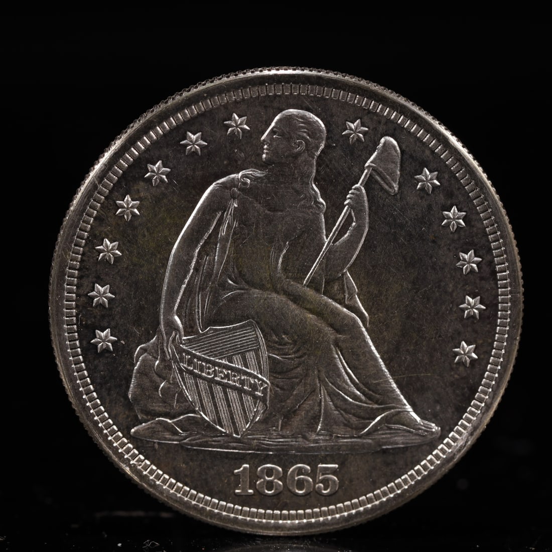 USA One Dollar 1865 Coin: American coin. IN GOD WE TRUST / LIBERTY / 1865 / UNITED STATES OF AMERICA / ONE DOL. Weight:26.9g.