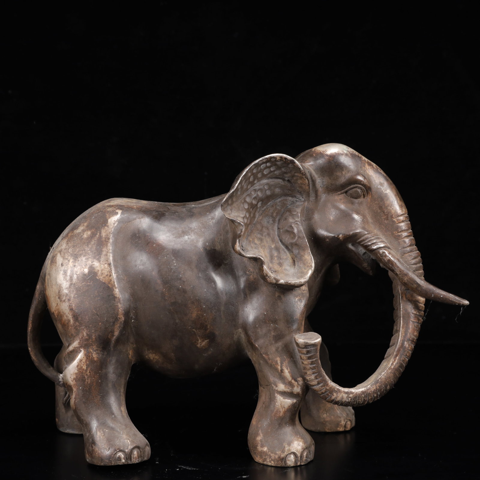 An Exquisite Silver-plated Elephant Ornament: An Exquisite Silver-plated Elephant Ornament,Qing Dynasty,China,Size:10.6inx4.3inx7.5in,Weight:2950g 镀银象摆件,中国清代