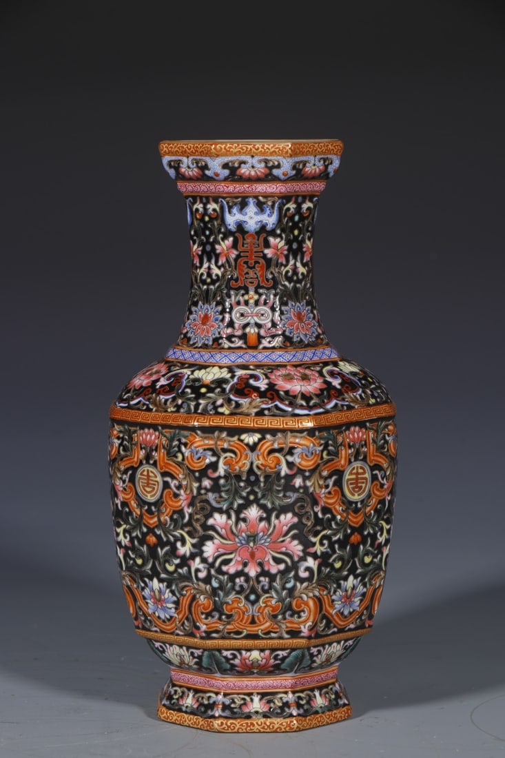 An Exquisite Black Ground Enamel Lotus Pattern Vase: An Exquisite Black Ground Enamel Lotus Pattern Vase,Qing Dynasty,China,Qianlong Four-character Mark,Size:8.5inx3in 黑地珐琅彩缠枝莲纹瓶,