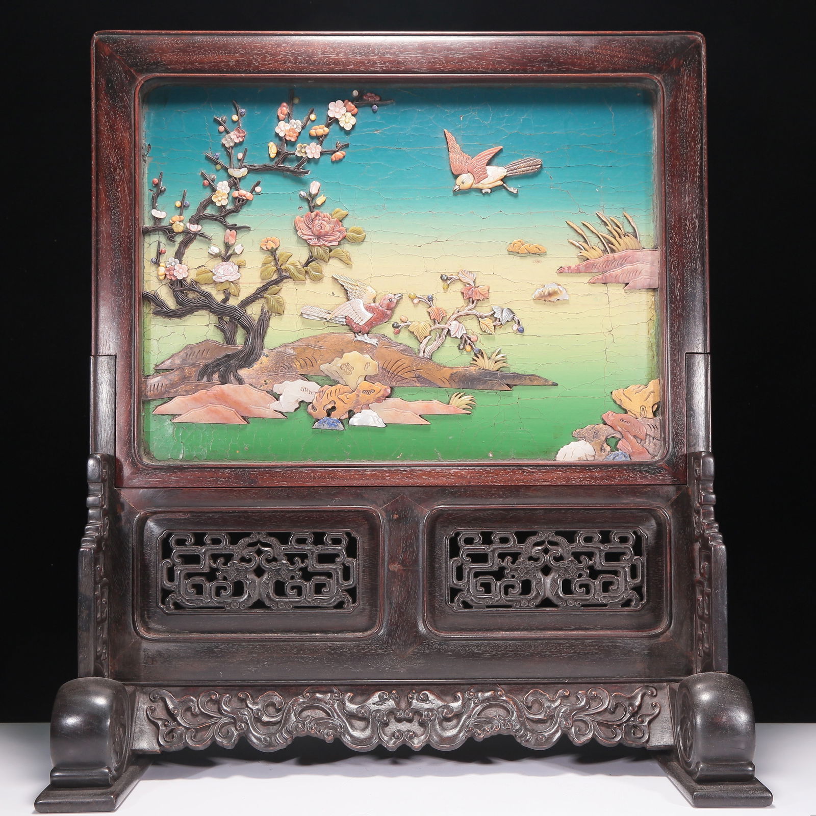 An Exquisite Wood-Lacquered Gem-Inlaid Gilded 'Bird& Flower' Table Screen With A Zitanwood Stand: An Exquisite Wood-Lacquered Gem-Inlaid Gilded 'Bird& Flower' Table Screen With A Zitanwood Stand. Of a rectangular shape, body enameled and inlaid in polychrome with flowers and birds with fine,
