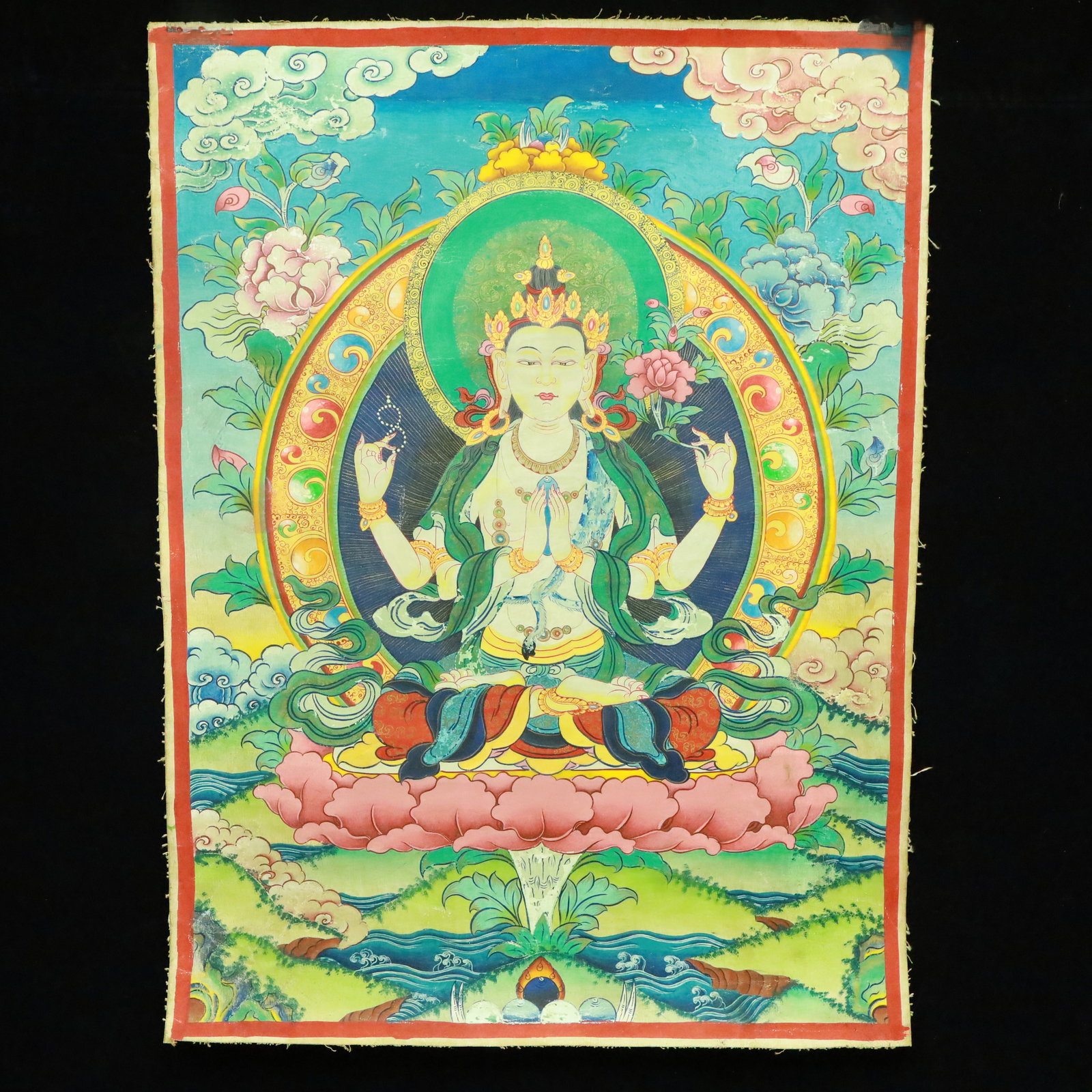 A Rare Brocade Painted Color Four-arms Statue of Avalokitesvara Tangka: A Rare Brocade Painted Color Four-arms Statue of Avalokitesvara Tangka,Qing Dynasty, China,Size:19.9inx26.8in 