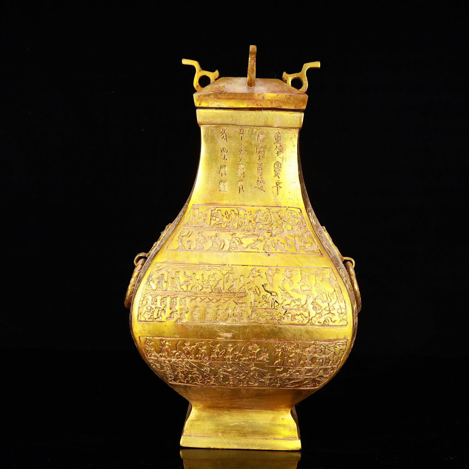 A Rare Gilt Bronze Figure Pattern Double-Ears Vase,With Inscription: A Rare Gilt Bronze Figure Pattern Double-Ears Vase,With Inscription,The Warring States period in China,With Mark,Size:7.9inx13.4in,Weight:4150g 