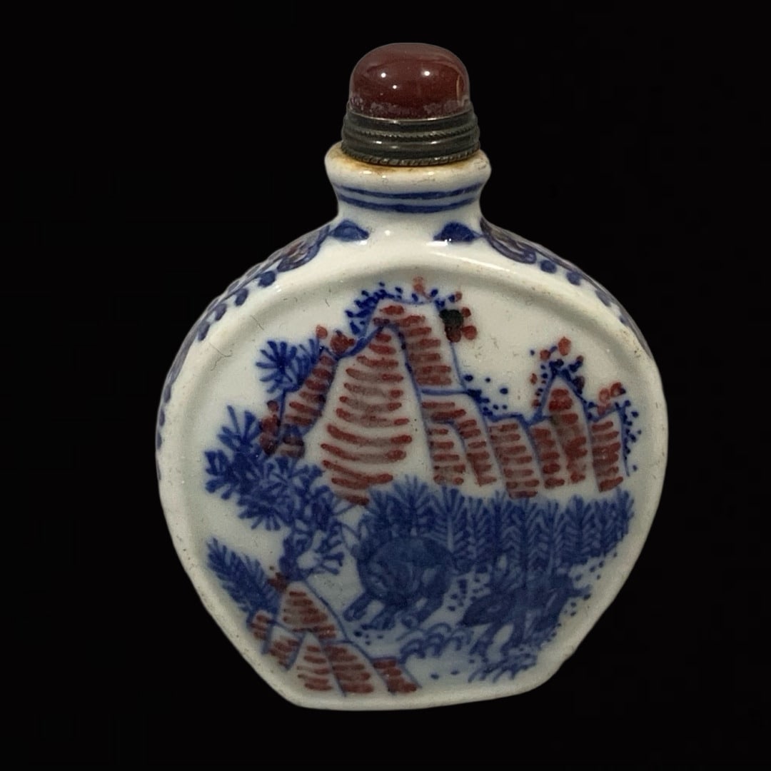 An Exquisite Blue and White Underglaze-Red Landscape Pattern Snuff Bottle: An Exquisite Blue and White Underglaze-Red Landscape Pattern Snuff Bottle,Qing Dynasty,China,Qianlong Four-character Mark,Size:2.6inx1.7in