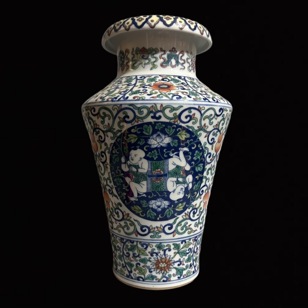 An Exquisite Doucai Lotus Pattern Vase: An Exquisite Doucai Lotus Pattern Vase,Qing Dynasty,China,Qianlong Six-character Mark,Size:6.7inx13.2in