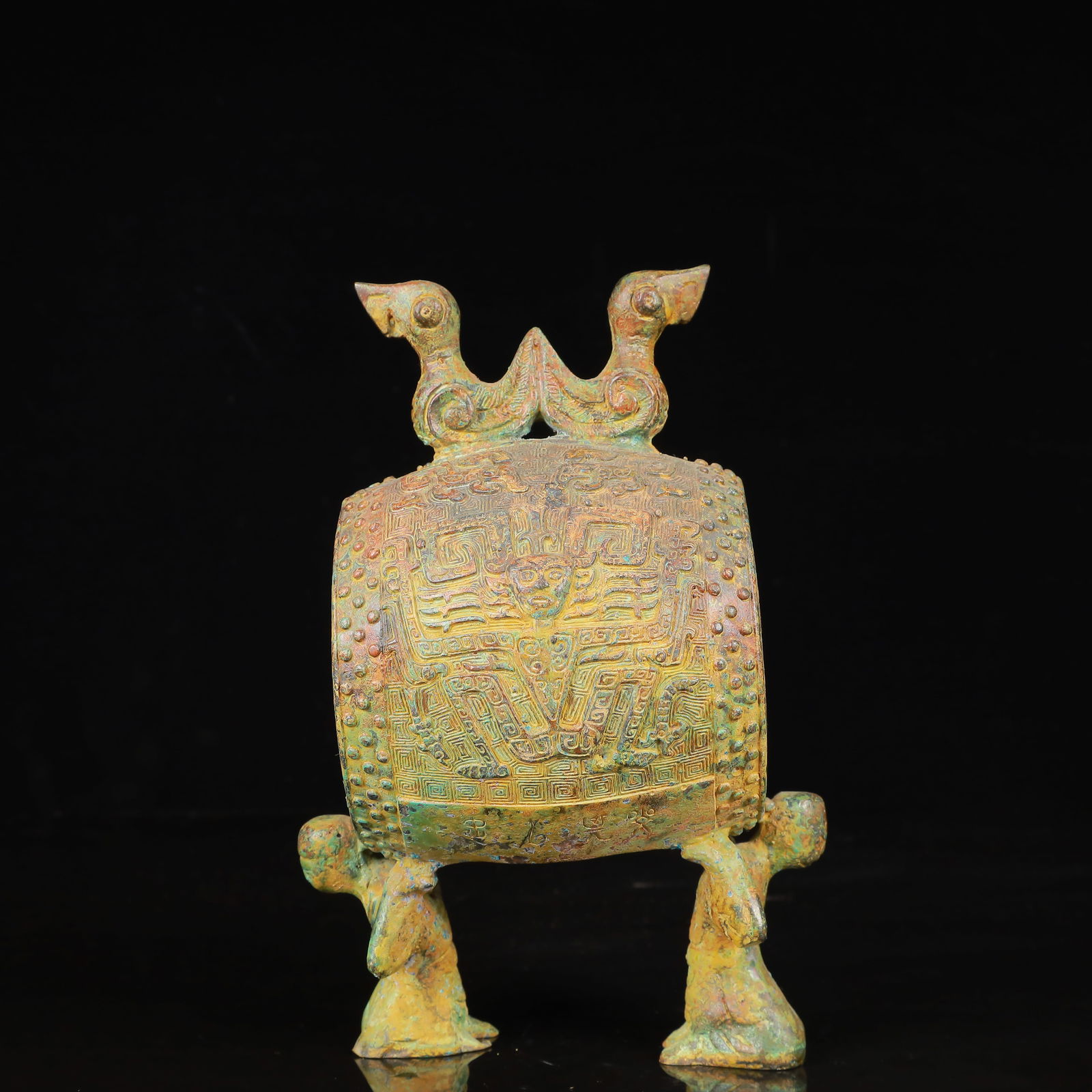 An Archaic Bronze Bird and Figure Drum: An Archaic Bronze Bird and Figure Drum,Han Dynasty,China,Size:5.5inx3.9inx8.7in,Weight:1550g 青铜鸟人鼓,中国汉代