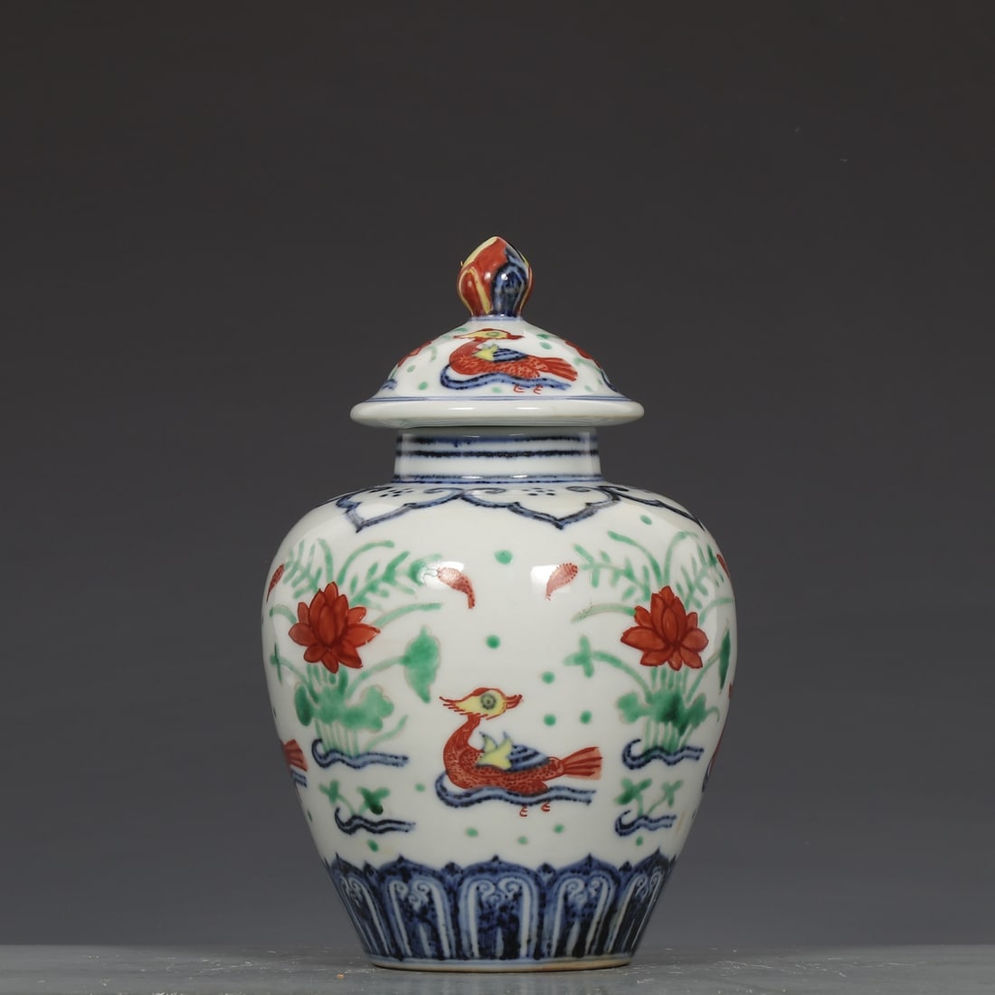 An Exquisite Blue and White Wucai Flower and Mandarin Duck Pattern Jar with Cover: An Exquisite Blue and White Wucai Flower and Mandarin Duck Pattern Jar with Cover,Ming Dynasty,China ,Xuande Six-character Mark,Size:7.7inx4.7in 