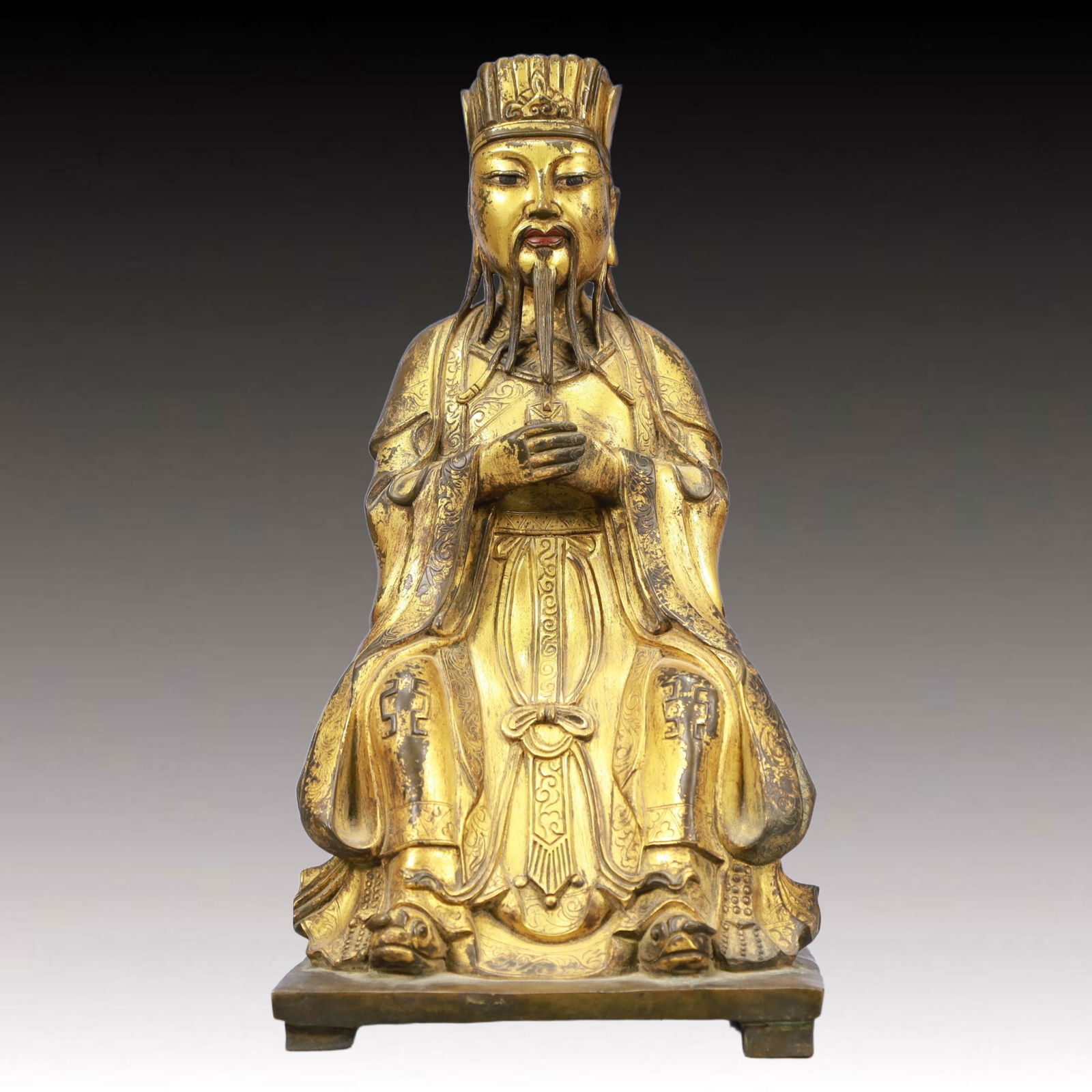 A Solemn Gilt Bronze Statue of Figure: A Solemn Gilt Bronze Statue of Figure,Ming Dynasty, China,Size:5.7inx5.1inx10.6inWeigh:3500g 铜鎏金人物像,中国明代