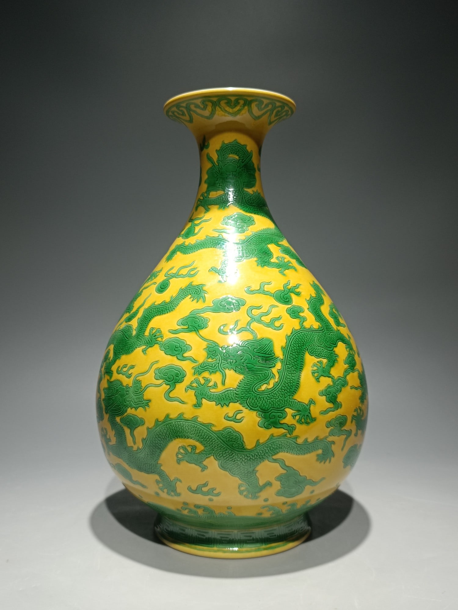 An Exquisite Biscuit Auspicious Cloud and Dragon Pattern Vase: An Exquisite Biscuit Auspicious Cloud and Dragon Pattern Vase,Qing Dynasty,China,Qianlong Six-character Mark,Size:11.1inx7.1in 