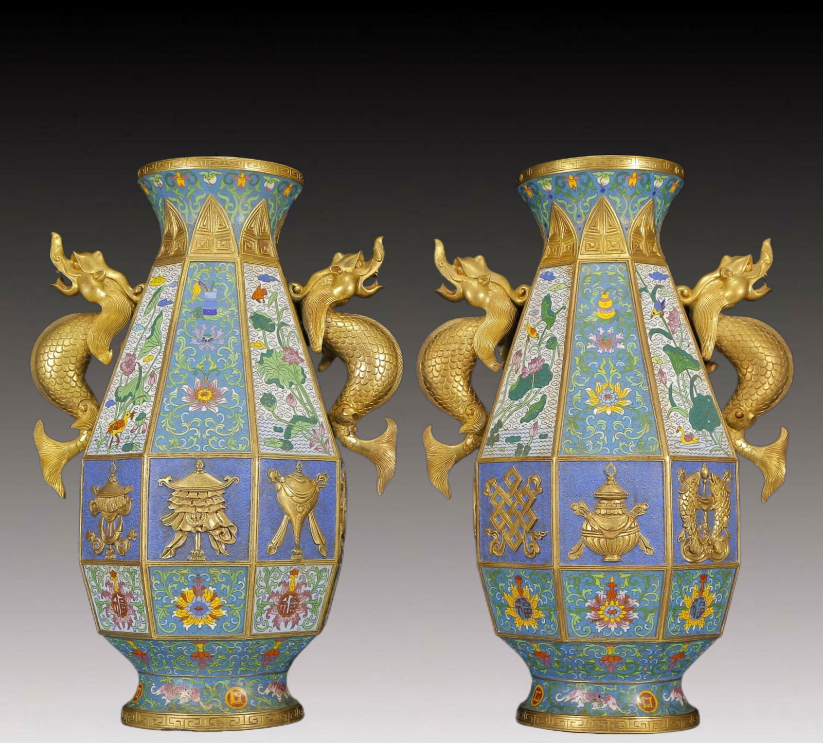 A Pair of Huge Cloisonne Lotus and Eight Treasures Pattern Dragon-Ears Vases: A Pair of Huge Cloisonne Lotus and Eight Treasures Pattern Dragon-Ears Vases,Qing Dynasty, China,Kangxi Four-character Mark,Size:11.8inx7.9inx16.9in,Weight:18450g 