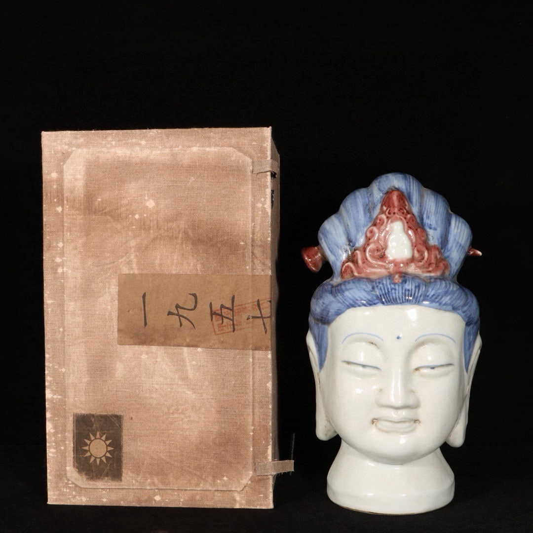 An Exquisite Blue and White Underglaze-Red Statue of Avalokitesvara Head: An Exquisite Blue and White Underglaze-Red Statue of Avalokitesvara Head,Ming Dynasty,China,Xuande Six-character Mark,Size:10.8inx5.9in 