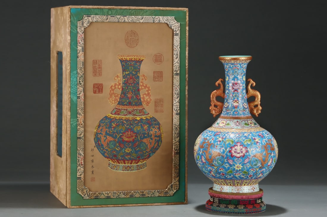 A Rare Blue Ground Famille-Rose Painted Gold Auspicious Cloud and Dragon Pattern Double-Ears Vase: A Rare Blue Ground Famille-Rose Painted Gold Auspicious Cloud and Dragon Pattern Double-Ears Vase,Qing Dynasty,China,Qianlong Four-character Mark,Size:13.1inx8.1in 