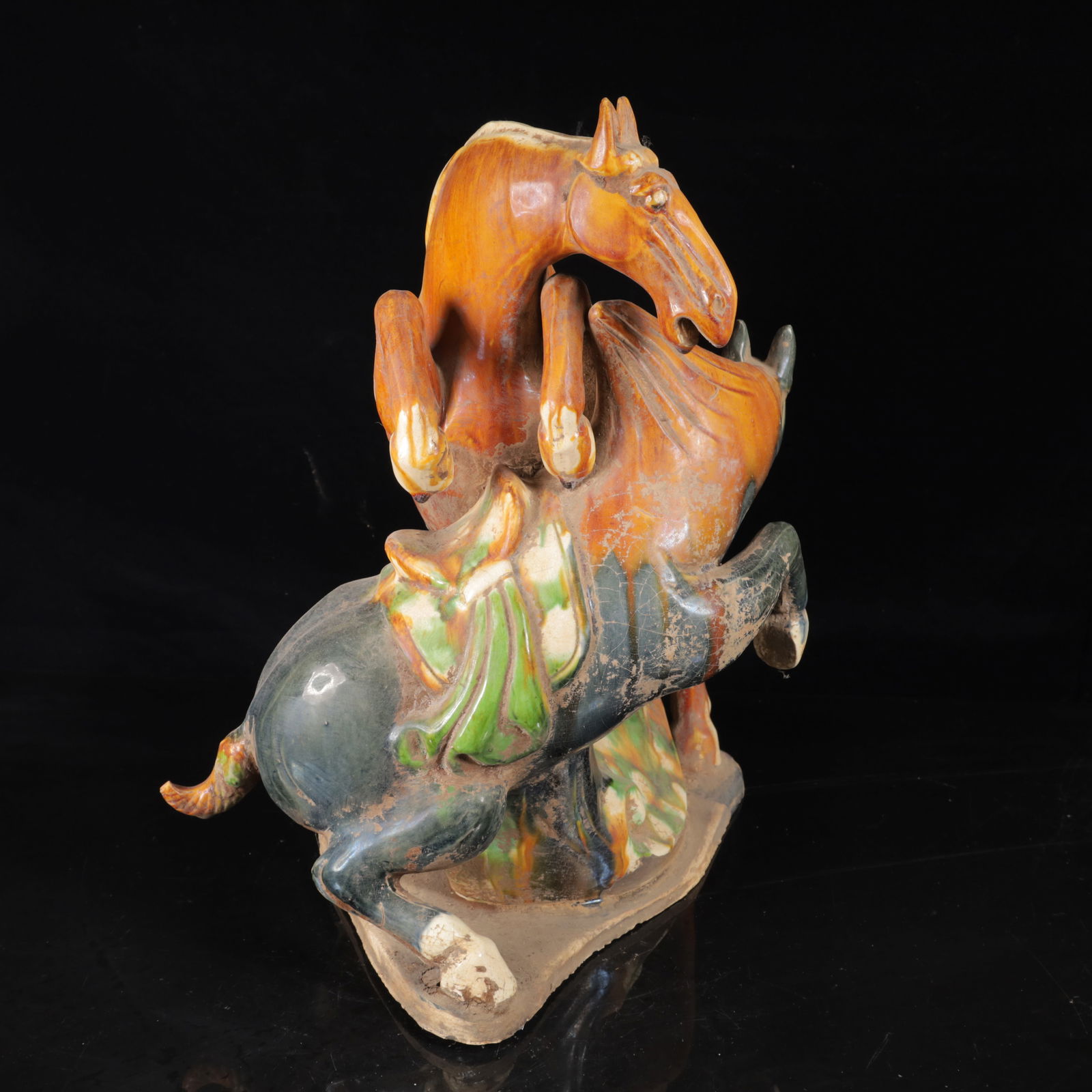 An Exquisite Tang Tri-Color Glazed Pottery Horse Ornament: An Exquisite Tang Tri-Color Glazed Pottery Horse Ornament,Tang Dynasty,China,Size:15.4inx12.6inx12.6in,Weight:6460g 唐三彩马摆件,中国唐代
